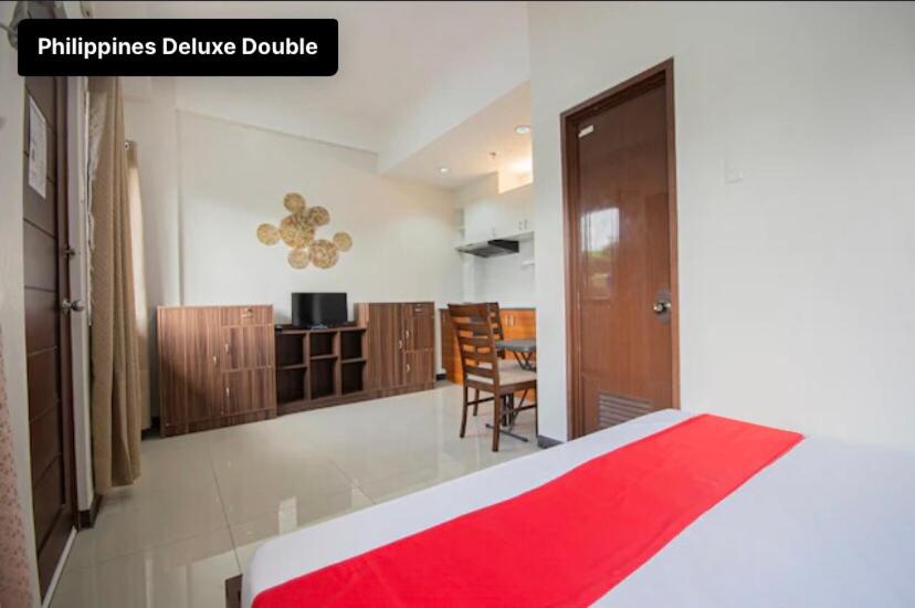 Deluxe Room (2 Adults + 1 Child) - Photo 1