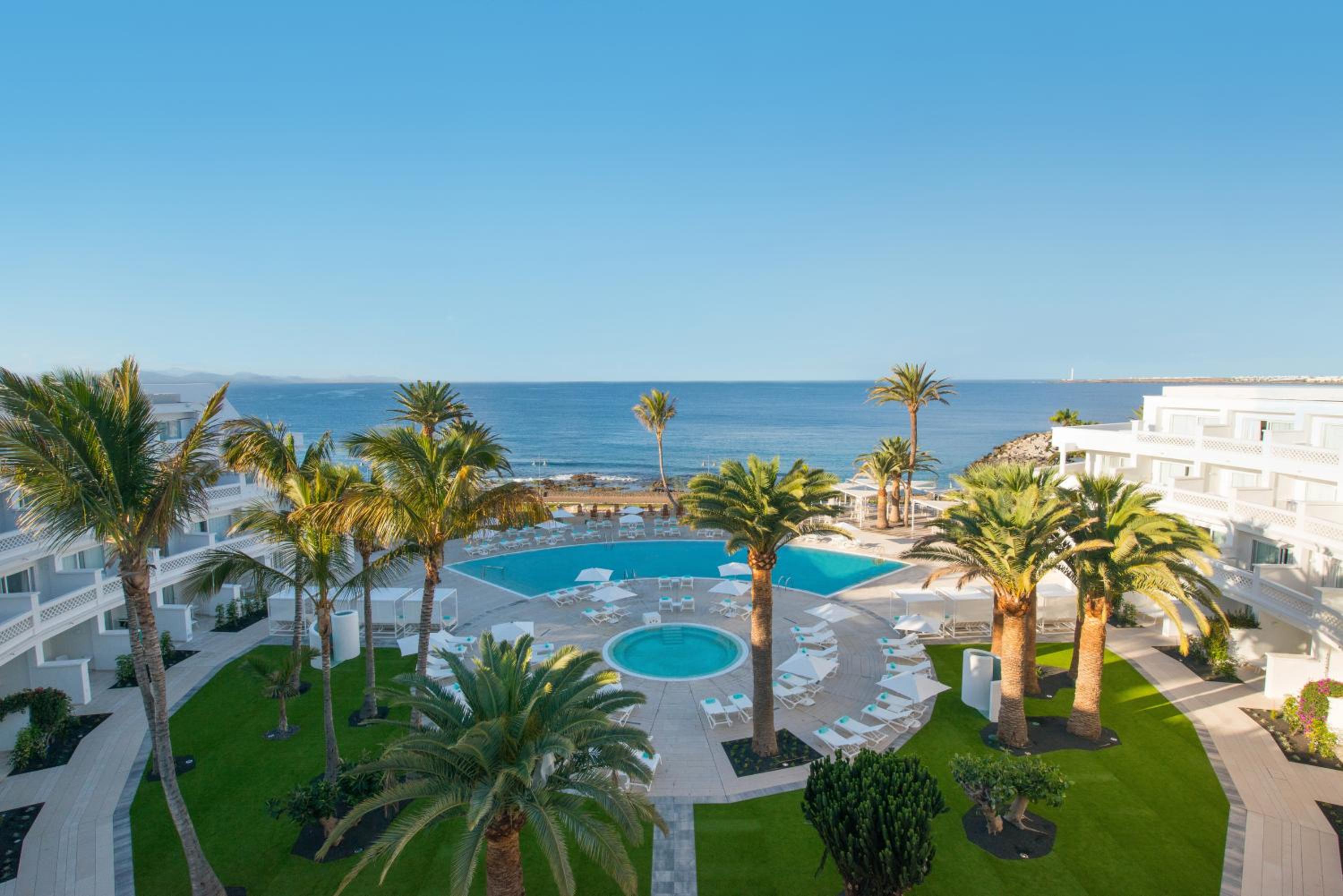 view of the pool and beach from our hotel room