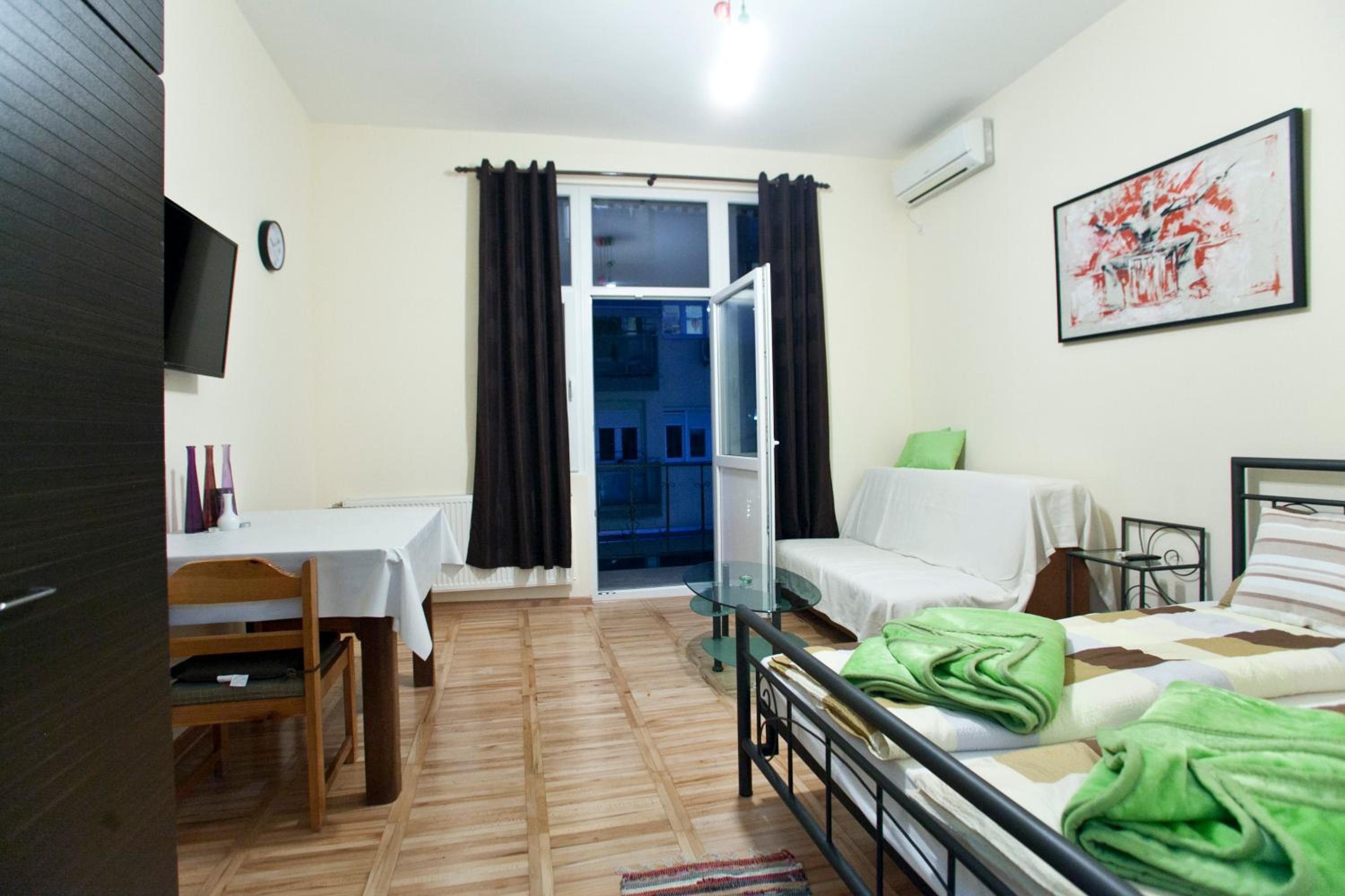 Family Room with Balcony - Photo 3