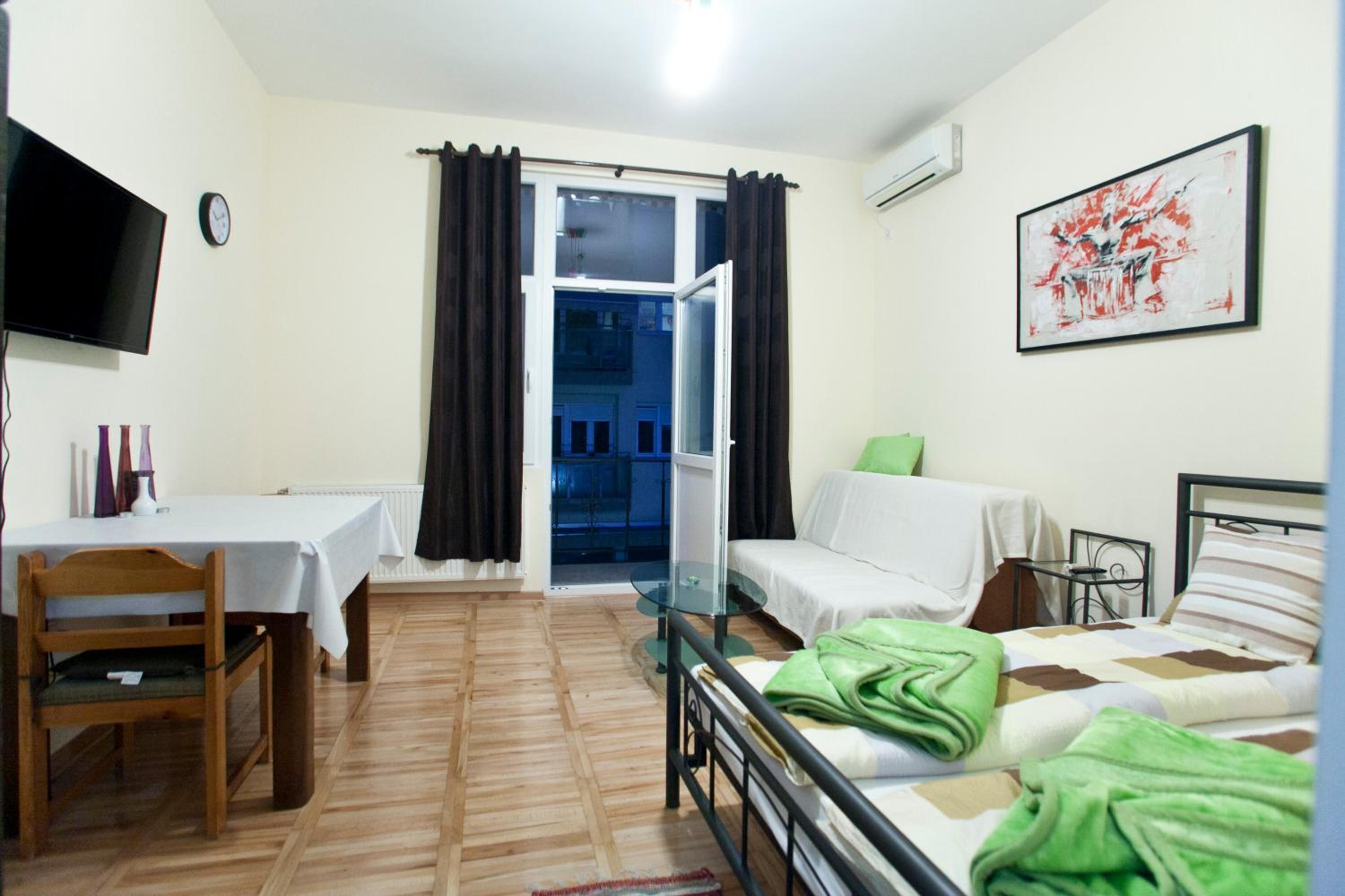 Family Room with Balcony - Photo 1