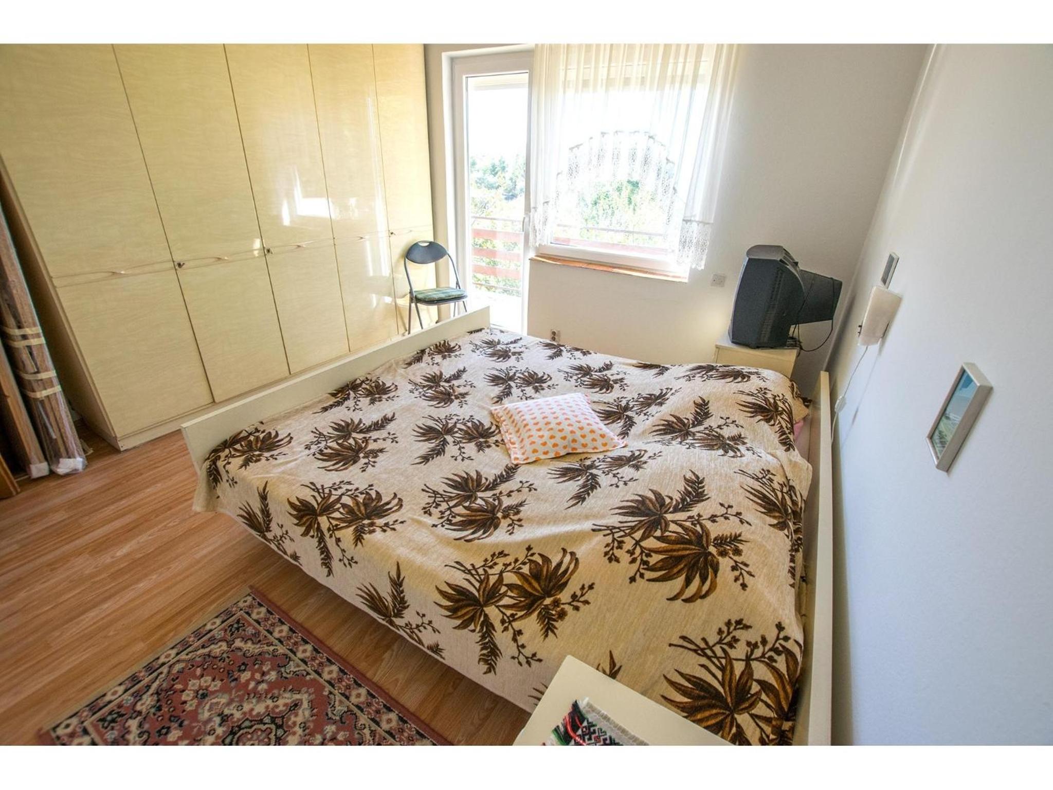 Three-Bedroom Apartment photo 1