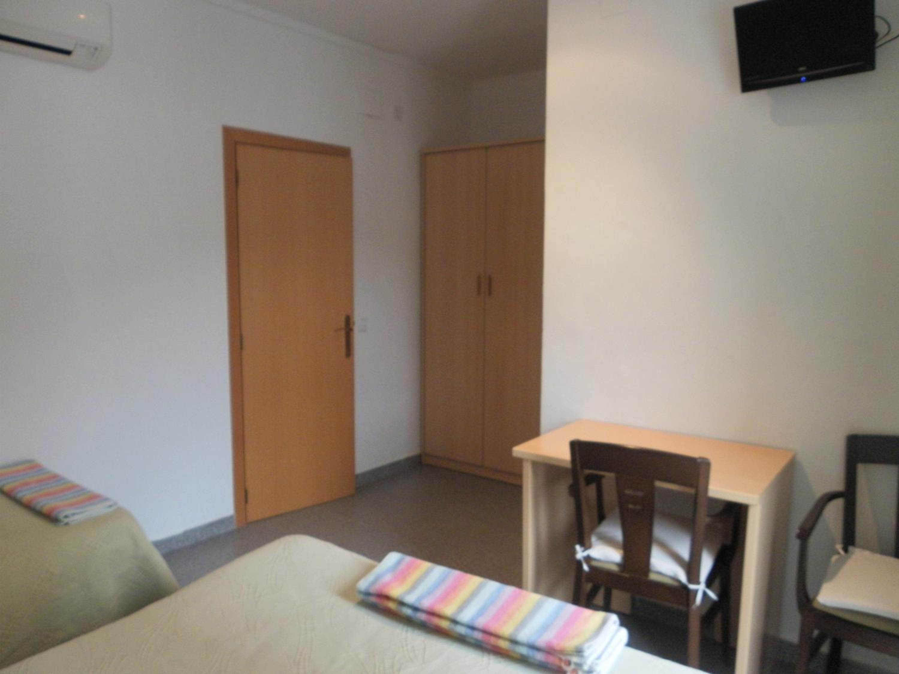 Habitación Triple con Balcón
