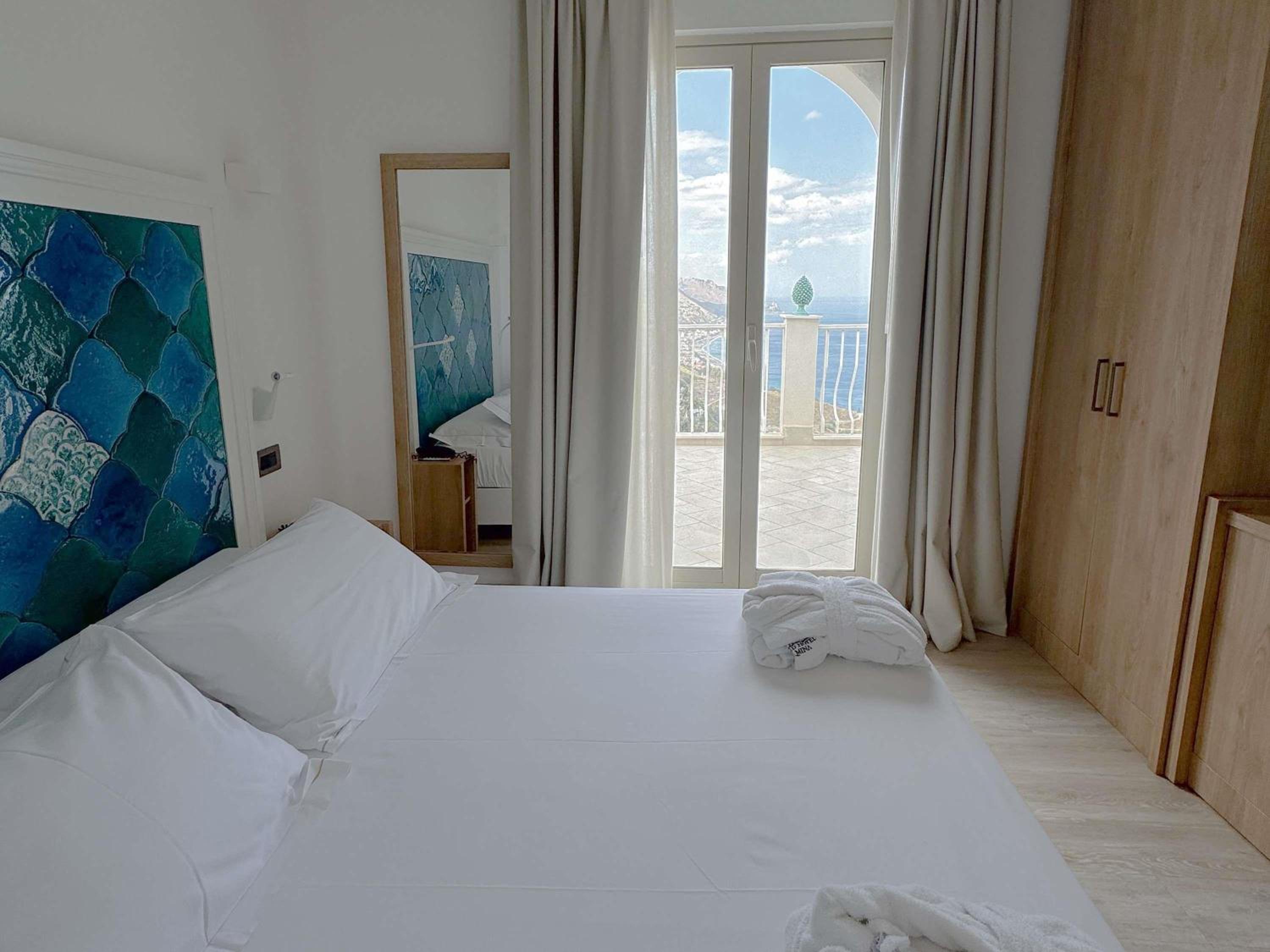 Deluxe Room with Queen Bed and Sofa Bed