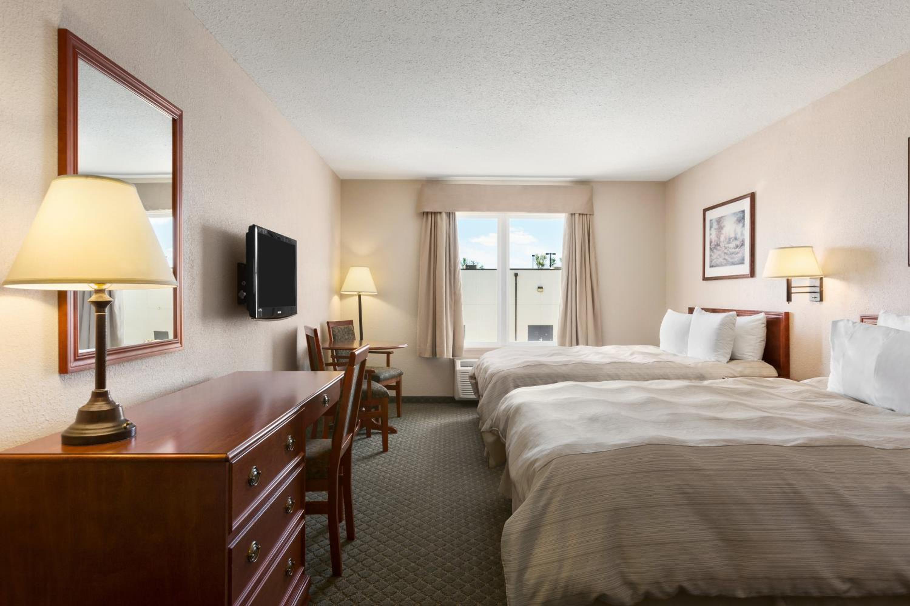 Queen Room with Two Queen Beds - Photo 1