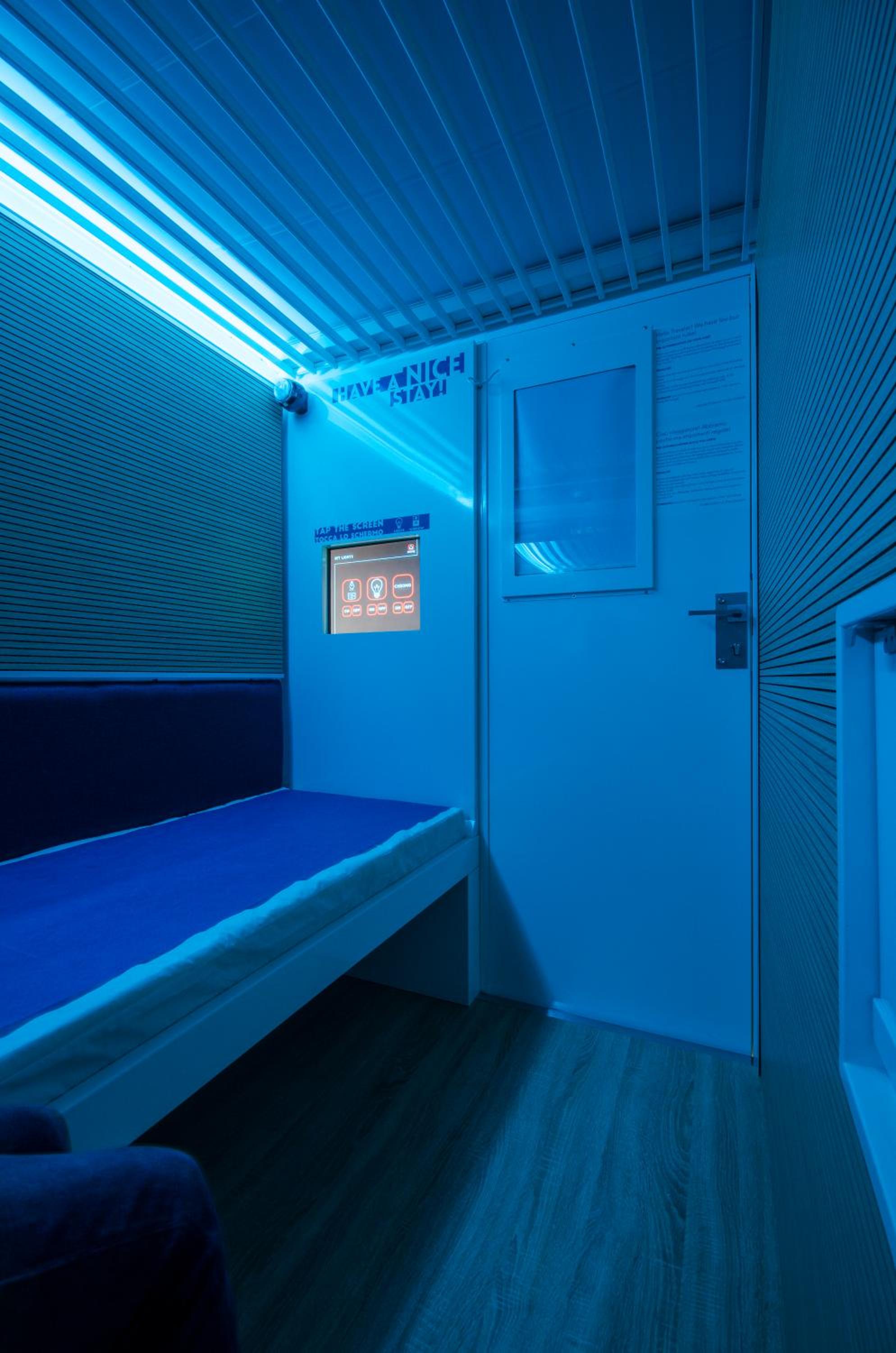 Capsule Room With Shared Bathroom