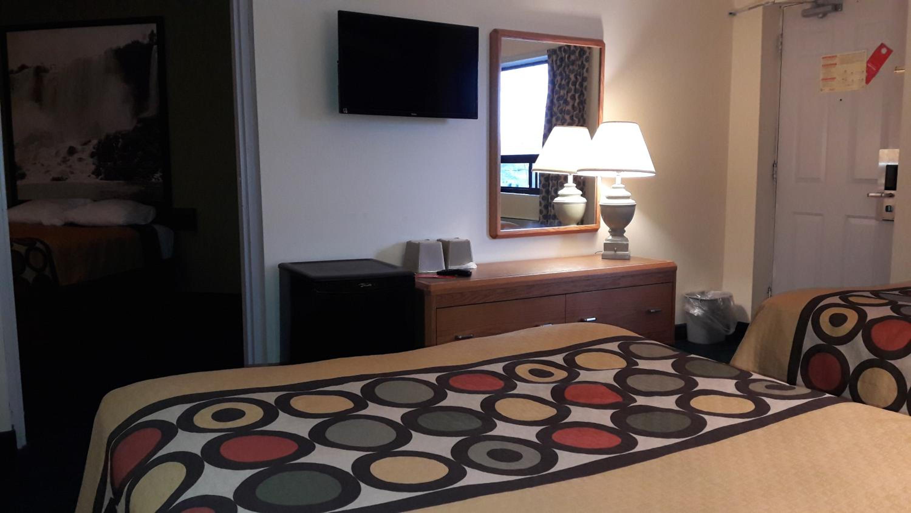 Suite with One Queen and Two Double Beds - Non-Smoking photo 1