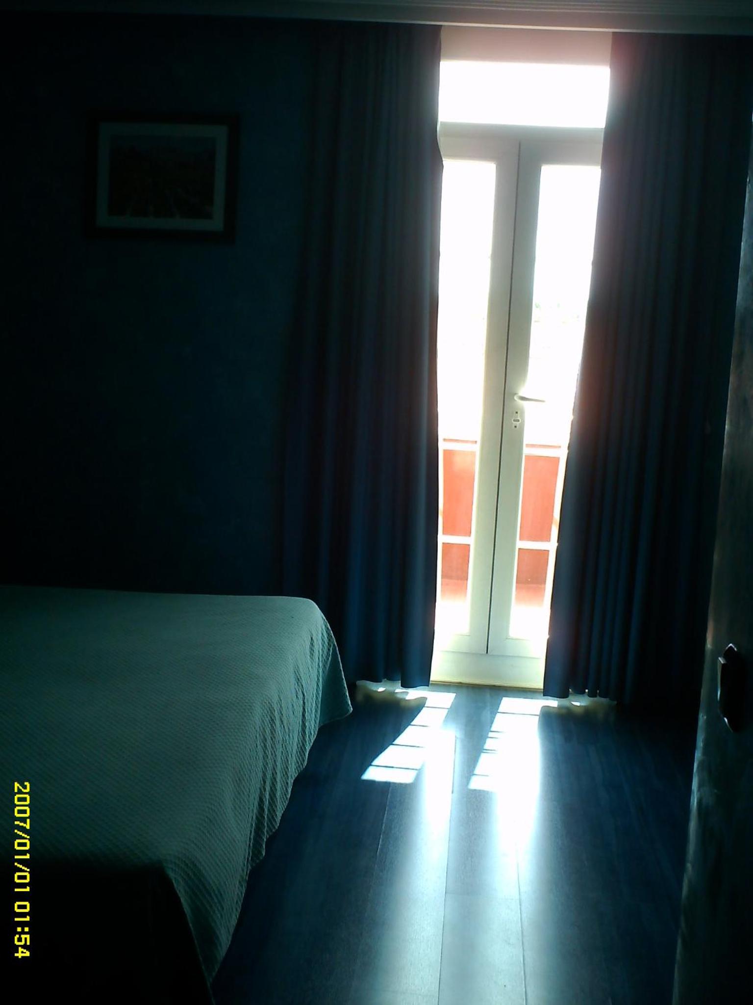 Habitación Cuádruple con Balcón