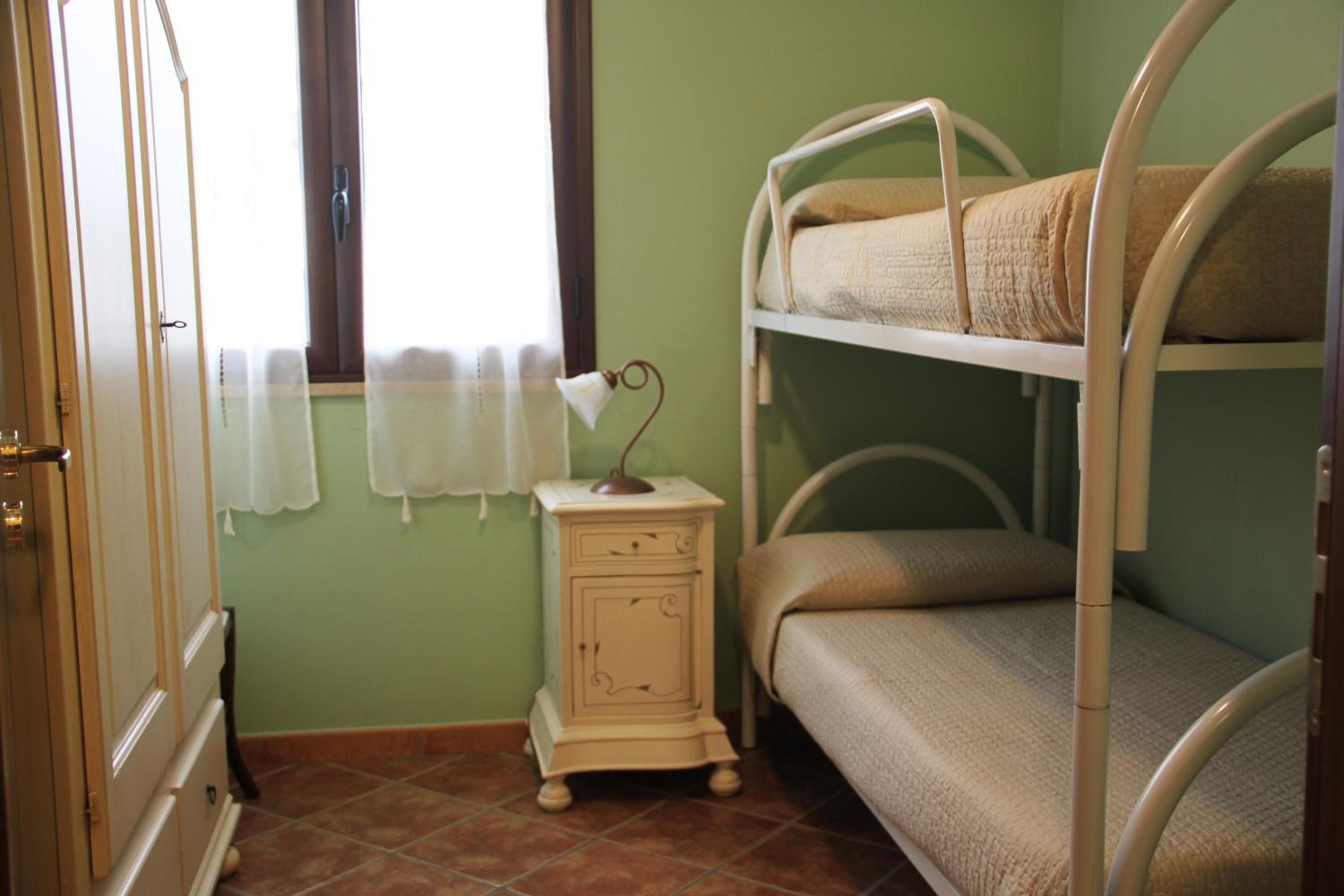 Three-Bedroom Apartment with Patio photo 2