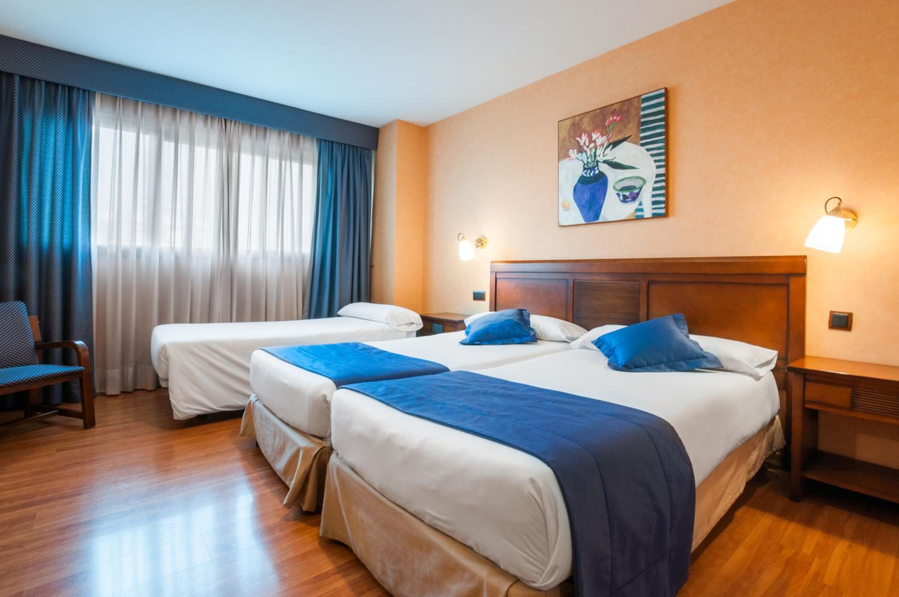 Habitación Doble con Cama Extra (2 adultos + 1 niño)