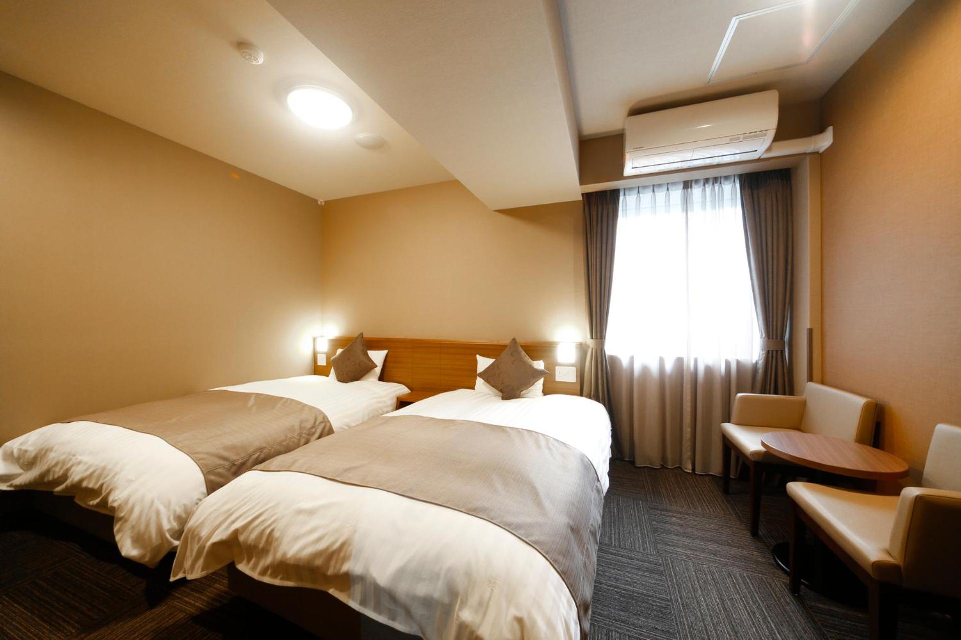 Deluxe Twin Room - No Daily Room Cleaning - Non Smoking photo 2