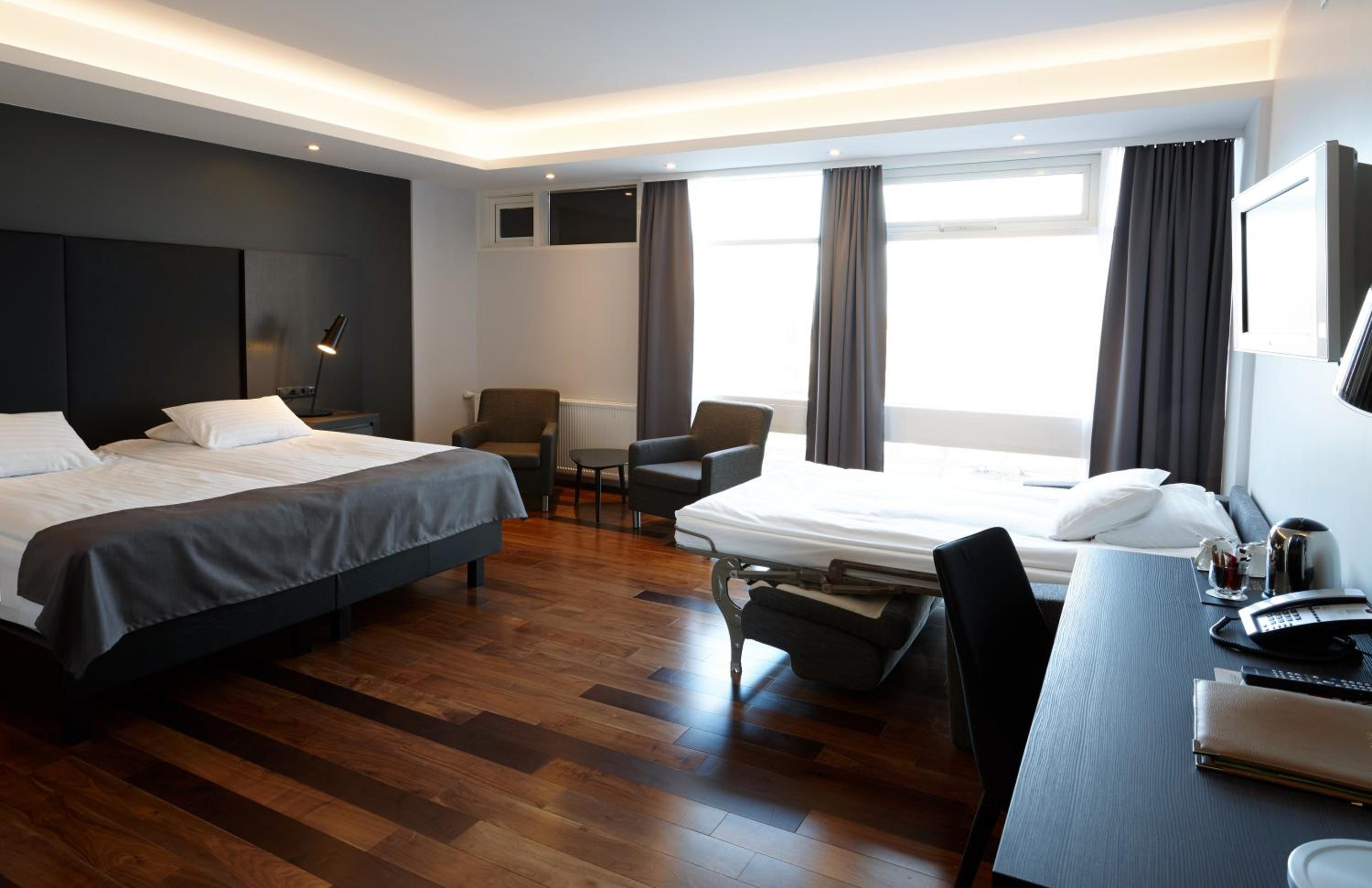 Relax in your spacious and stylish room retreat.