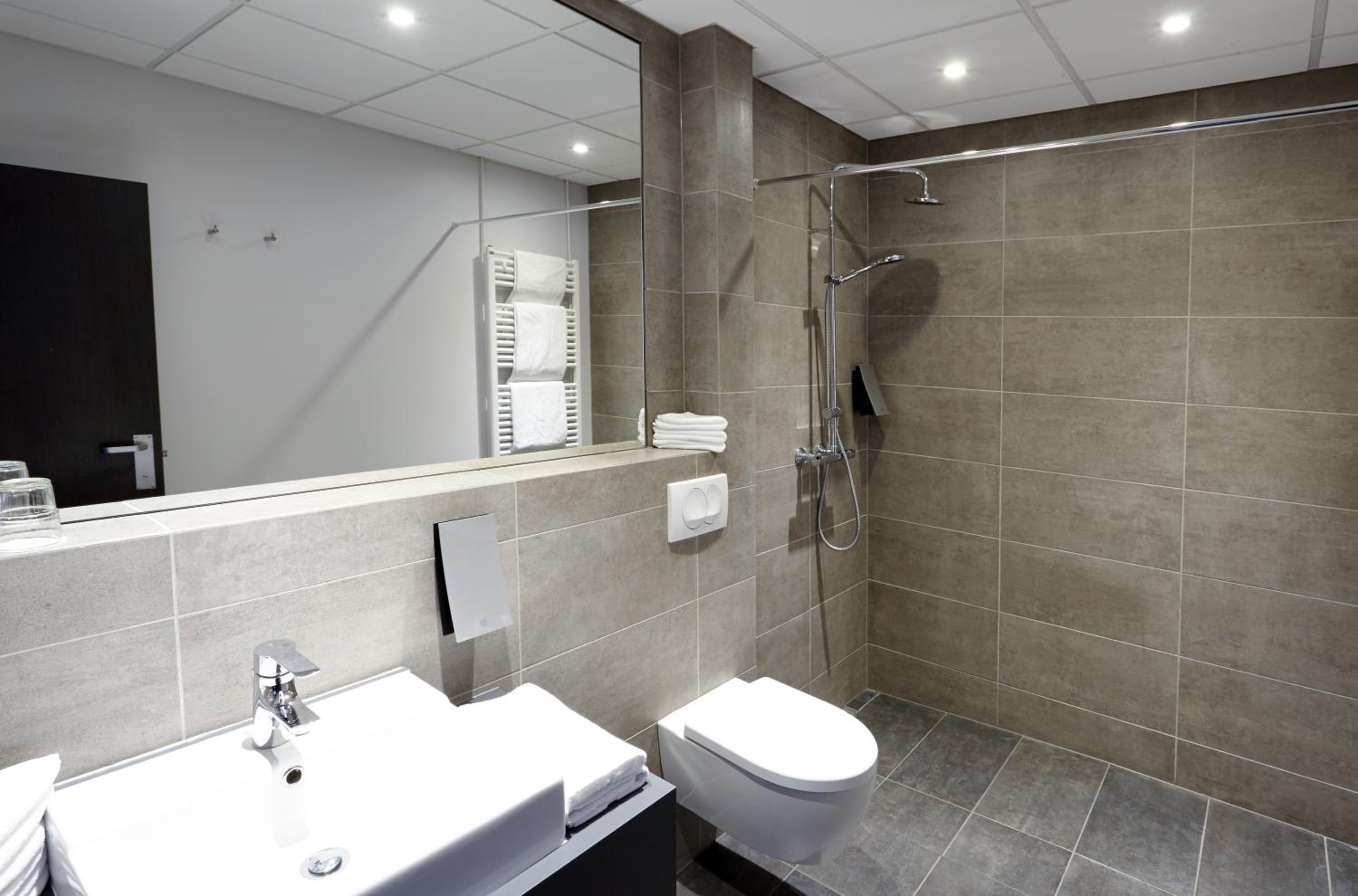 Relax in a modern, chic bathroom retreat!
