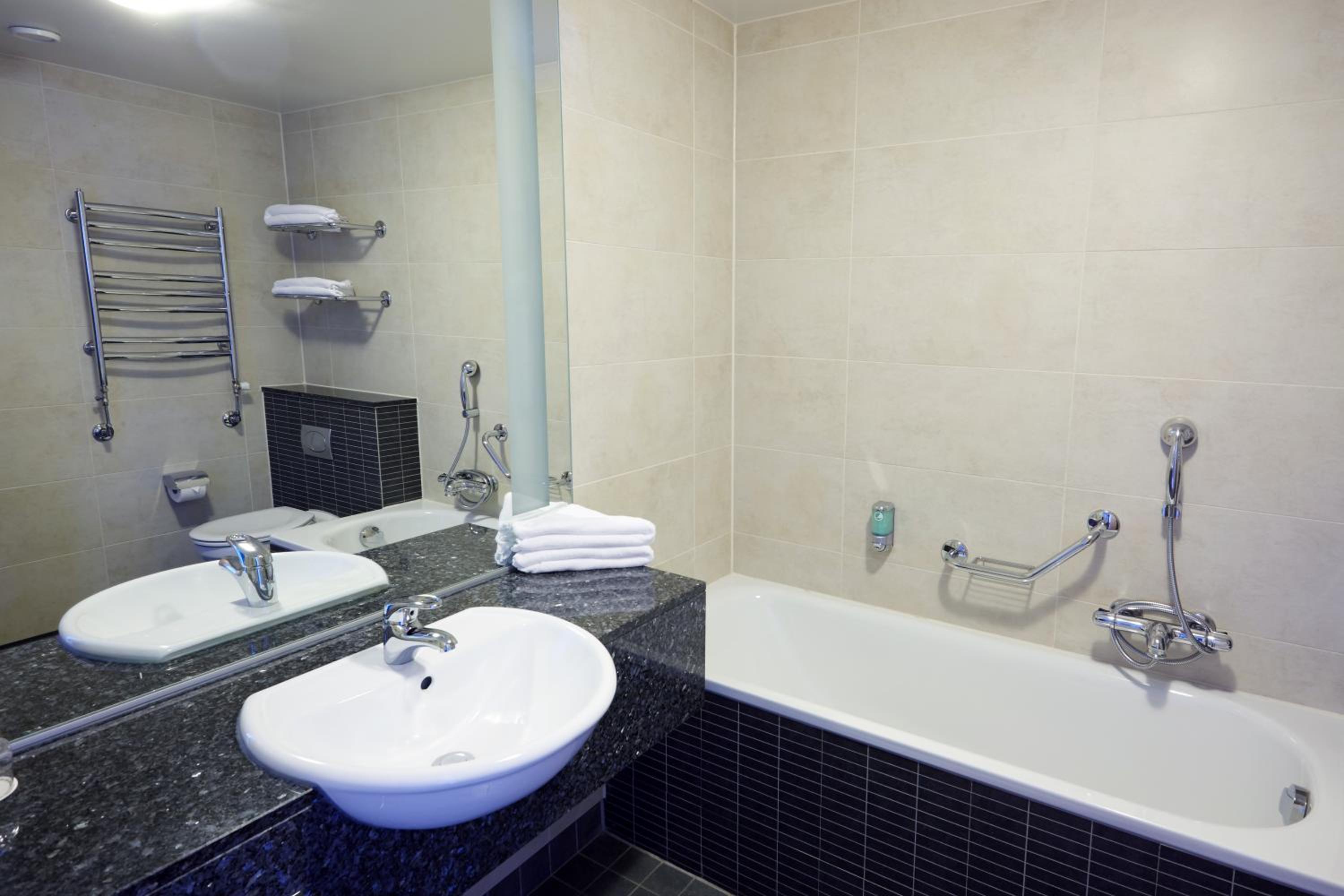 Relax in luxury with a spacious soaking tub.