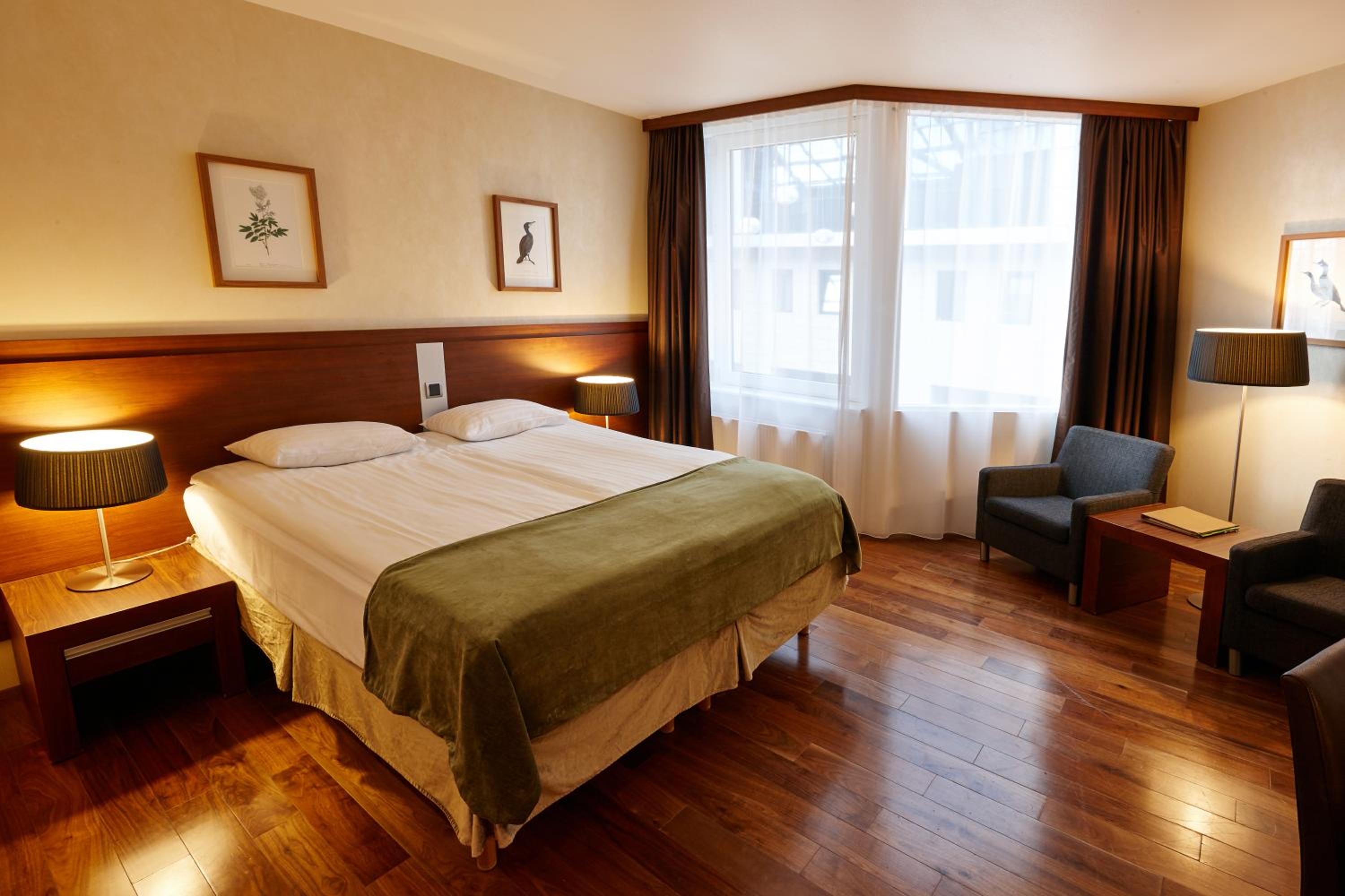 Relax in our cozy, elegantly designed hotel room.