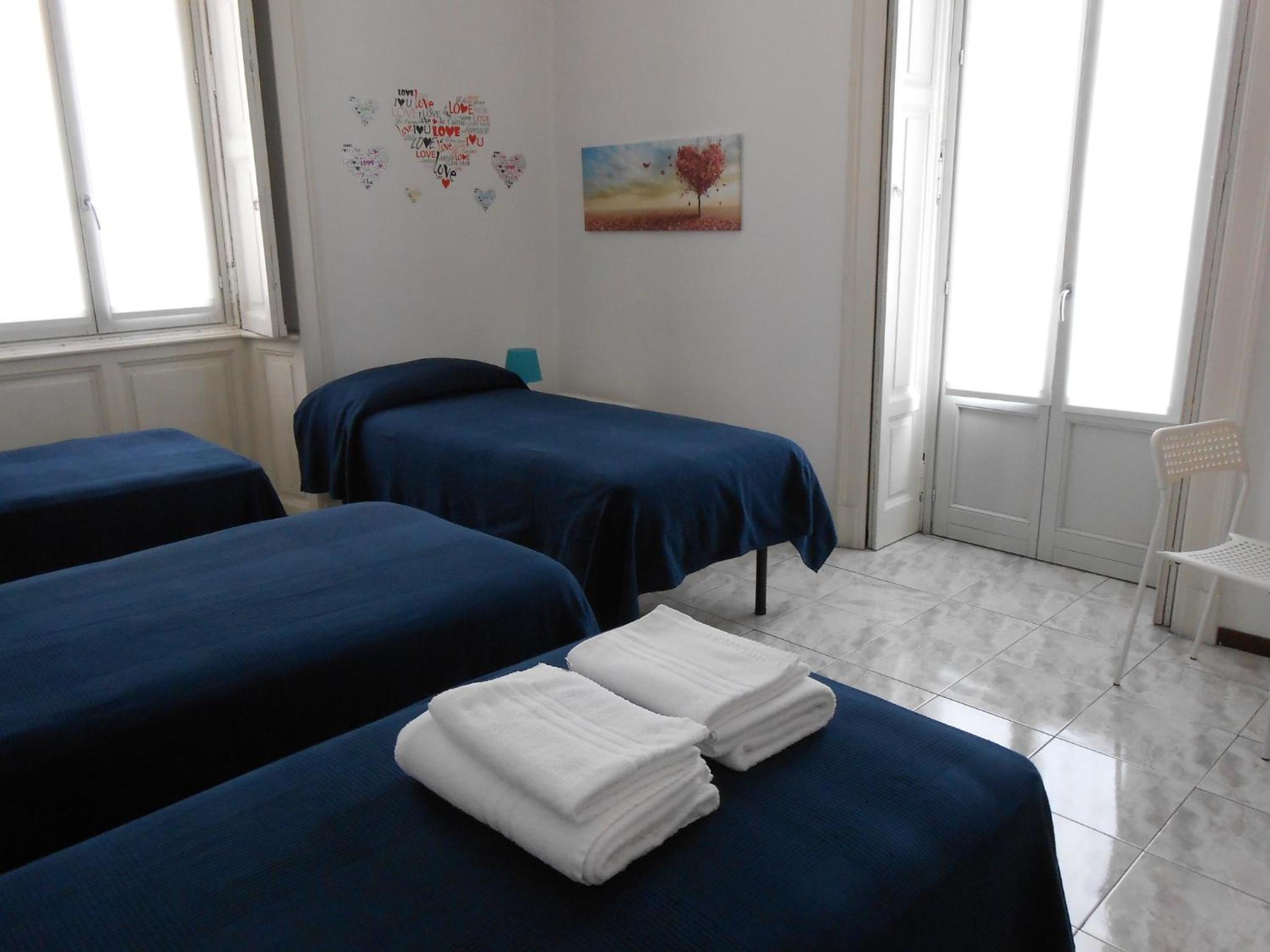 Economy Quadruple Room with Shared Bathroom