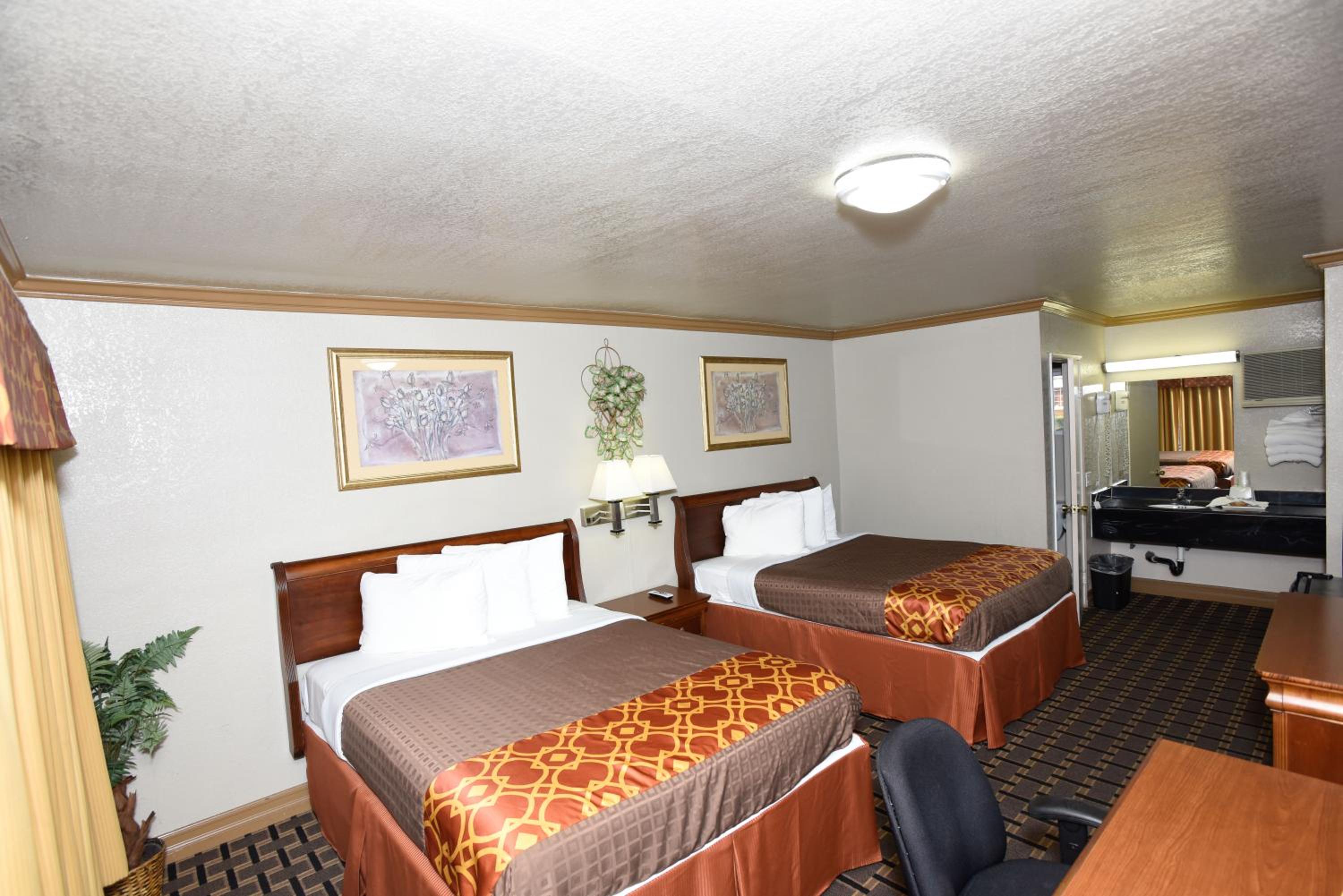 Queen Room with Two Queen Beds - Photo 1