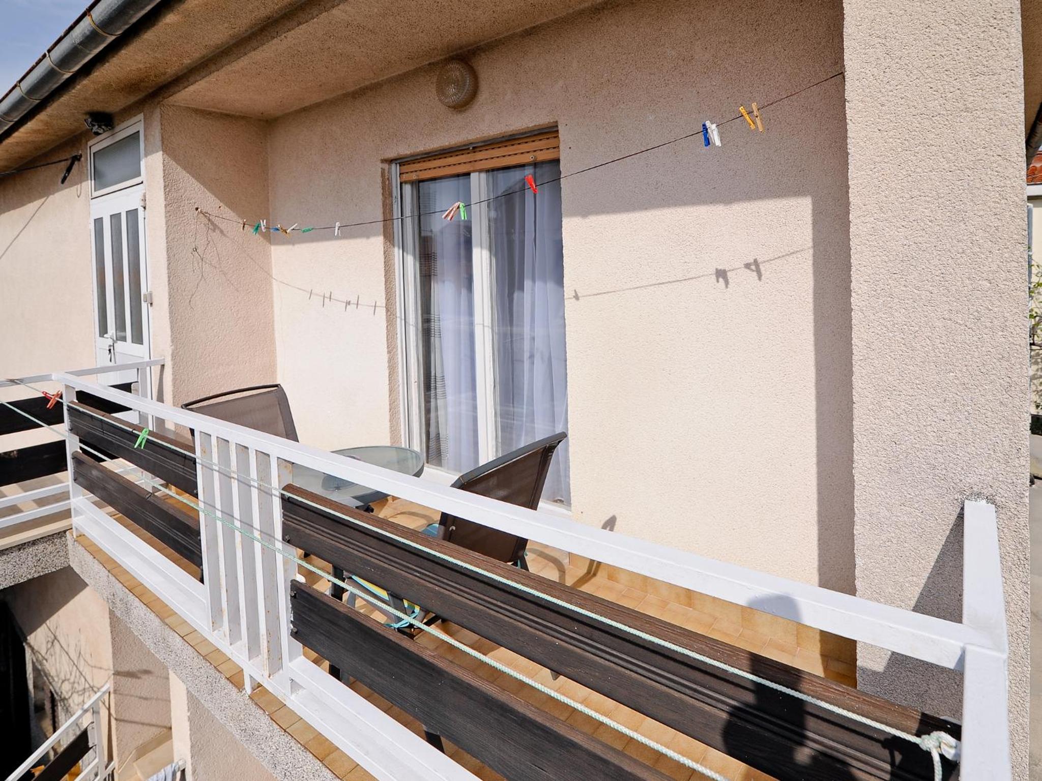Three-Bedroom Apartment with Balcony and Garden View