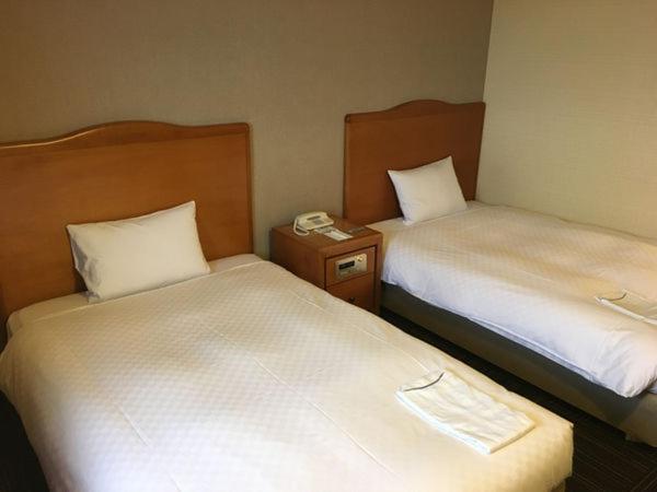 Standard Twin Room - Photo 5