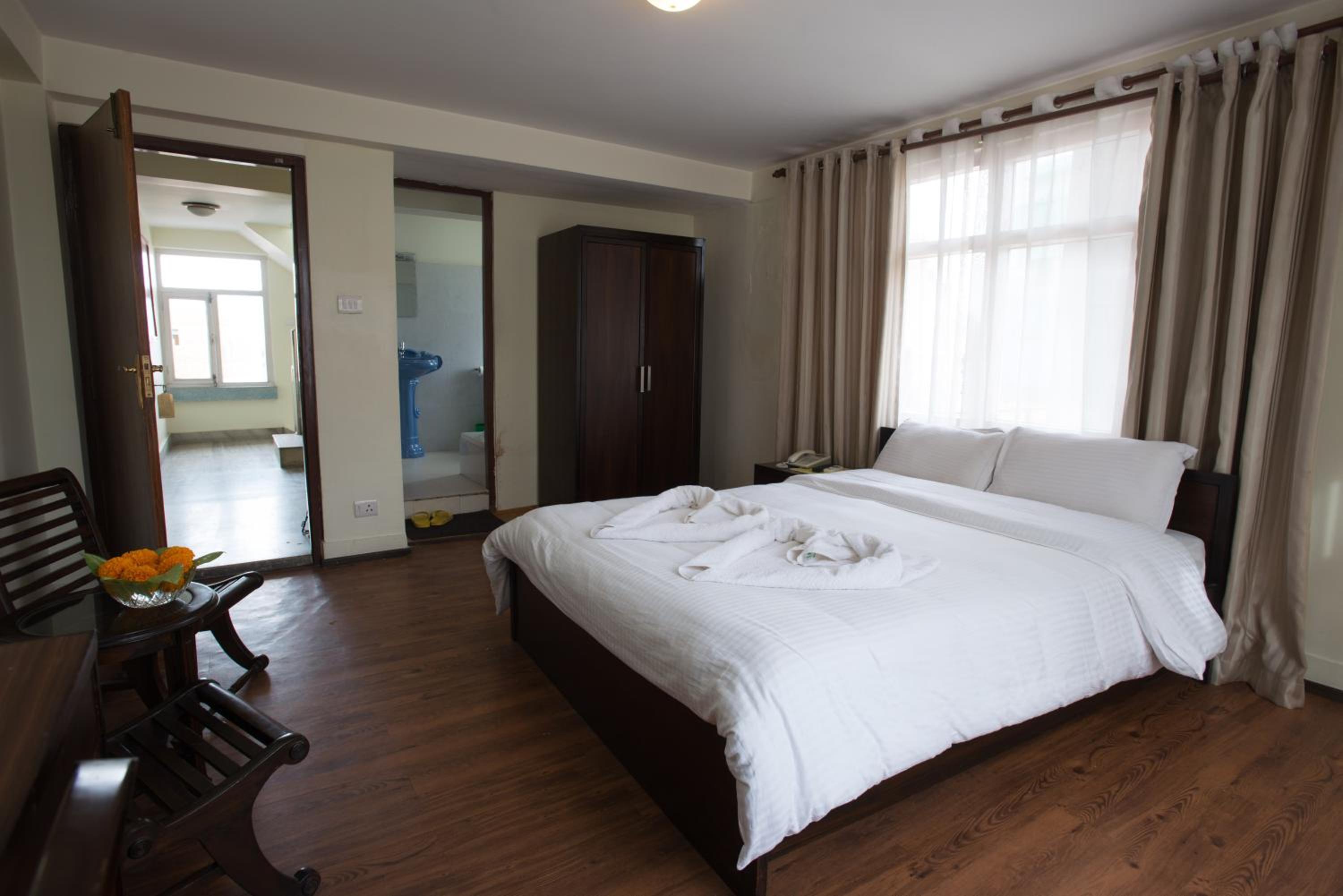 Super Deluxe Room with Balcony & Complimentary Airport Pickup for International Arrival photo 1