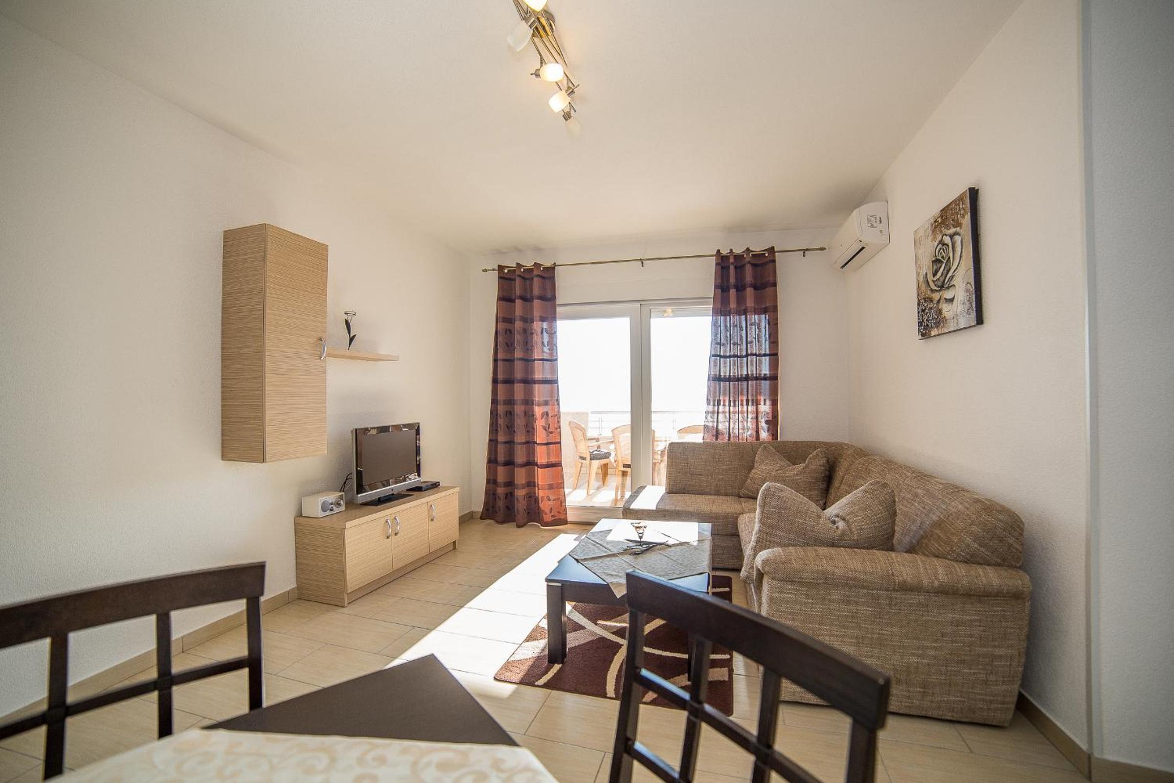 One-Bedroom Apartment with Terrace and Sea View