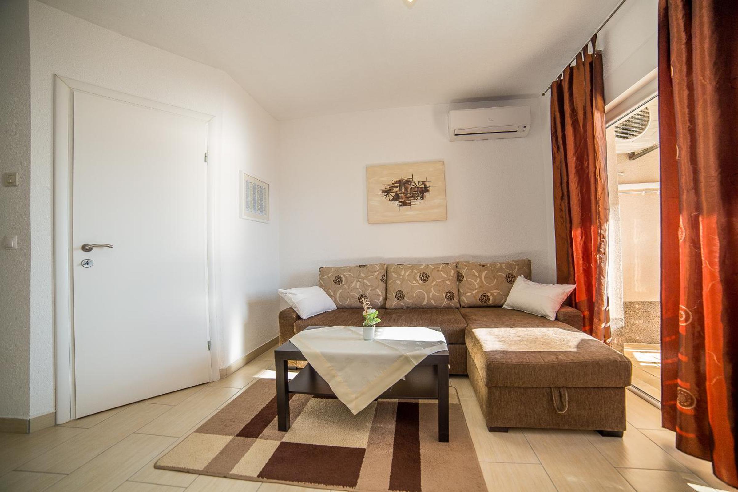 One-Bedroom Apartment with Patio and Sea View
