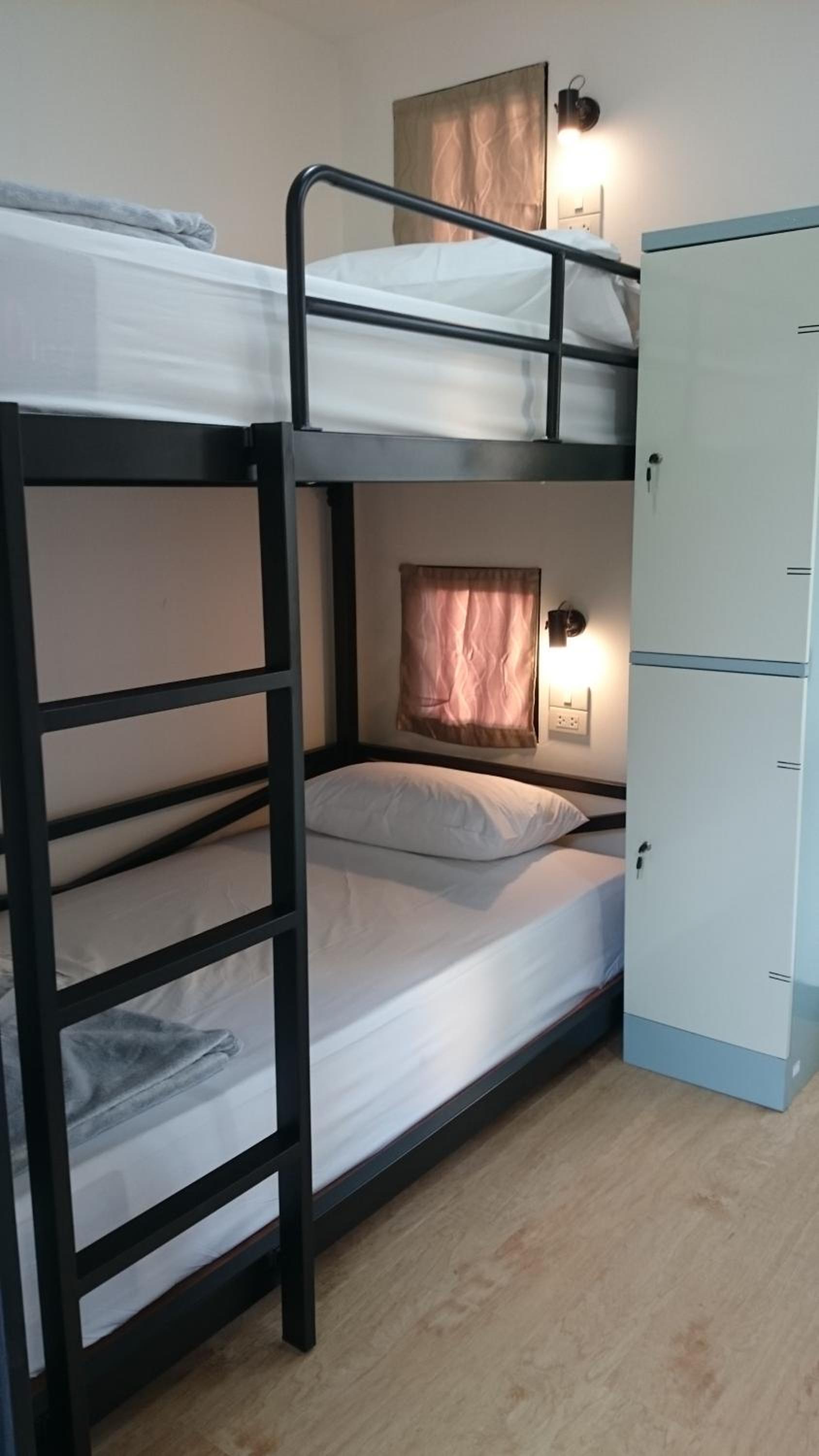 Bed in 4-Bed Mixed Dormitory Room Poolside photo 1