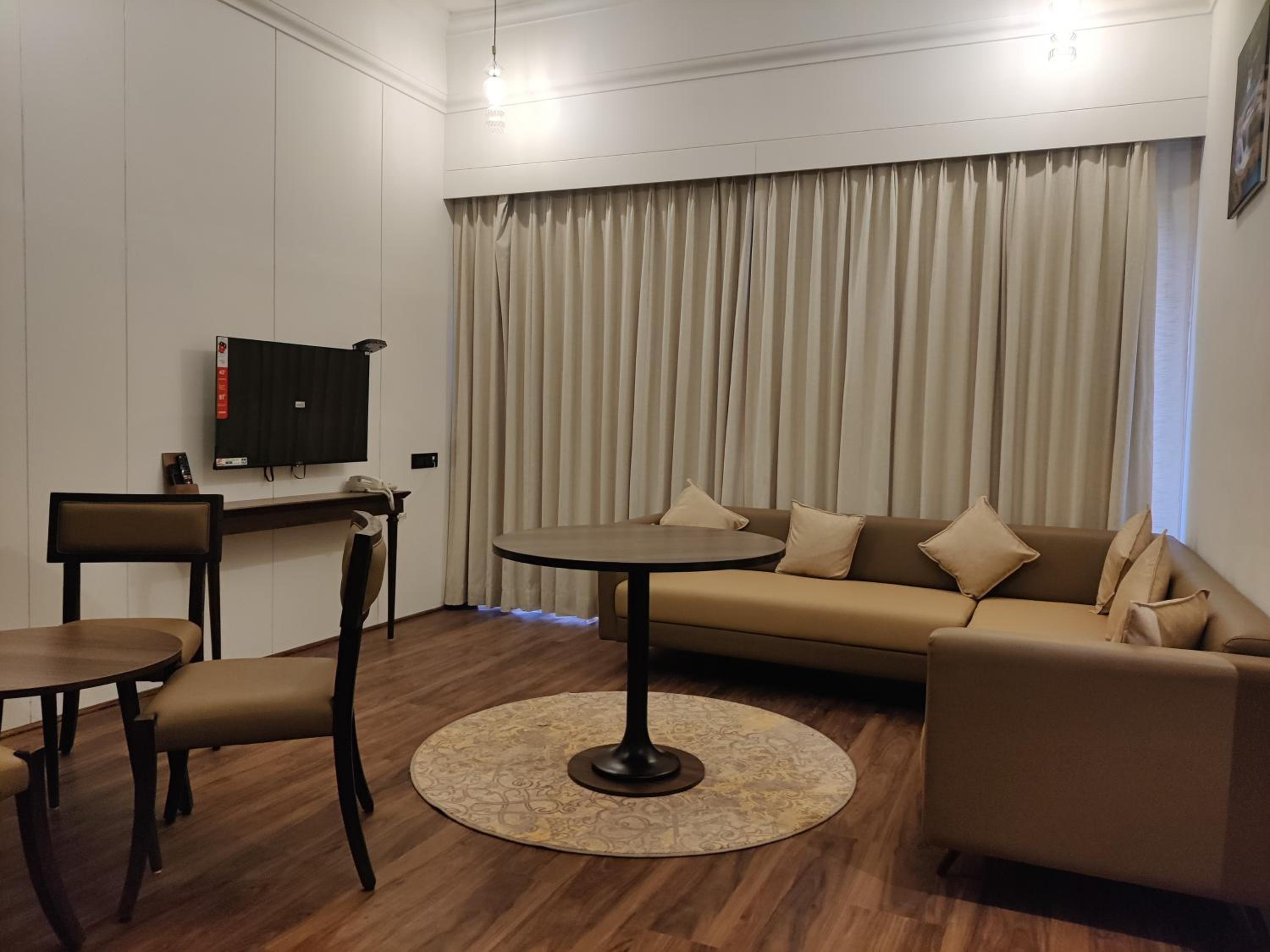 Fern Classic King Suite with Balcony and Mountain View at Bhanu The Fern Forest Resort & Spa Jambughoda, Series by Marriott