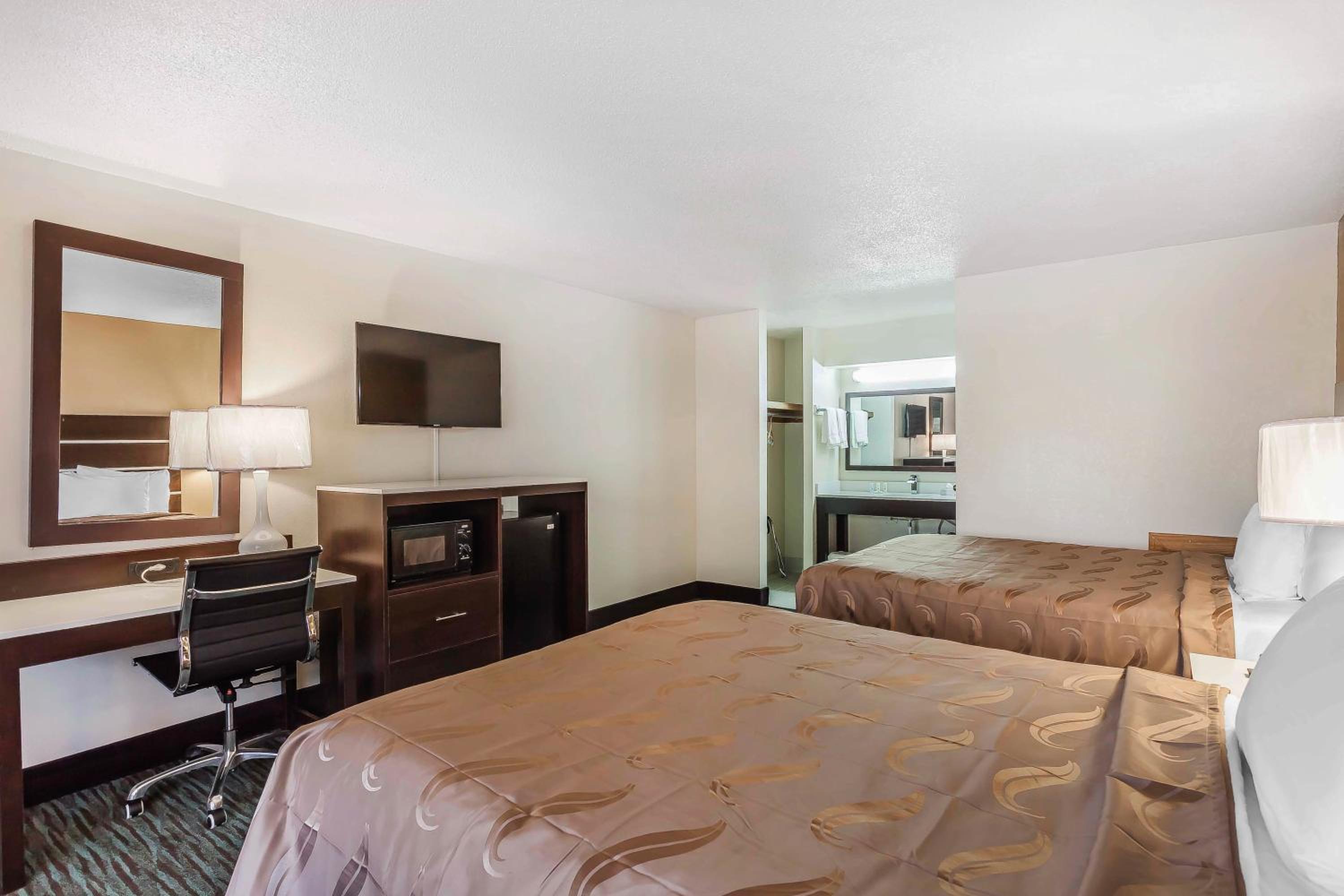 Queen Room with Two Queen Beds - Non-Smoking - Photo 1
