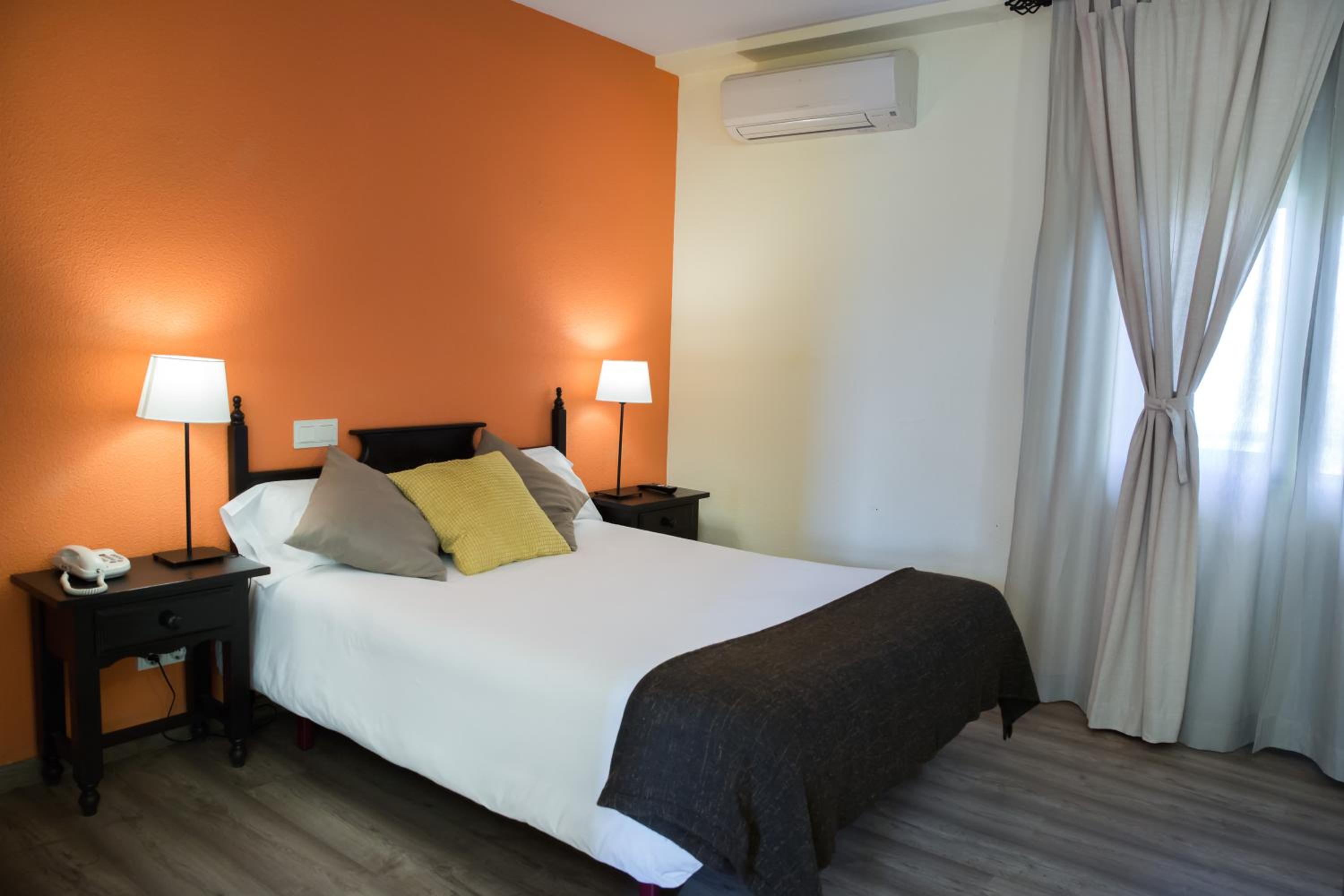Habitación Estándar con Cama Queen