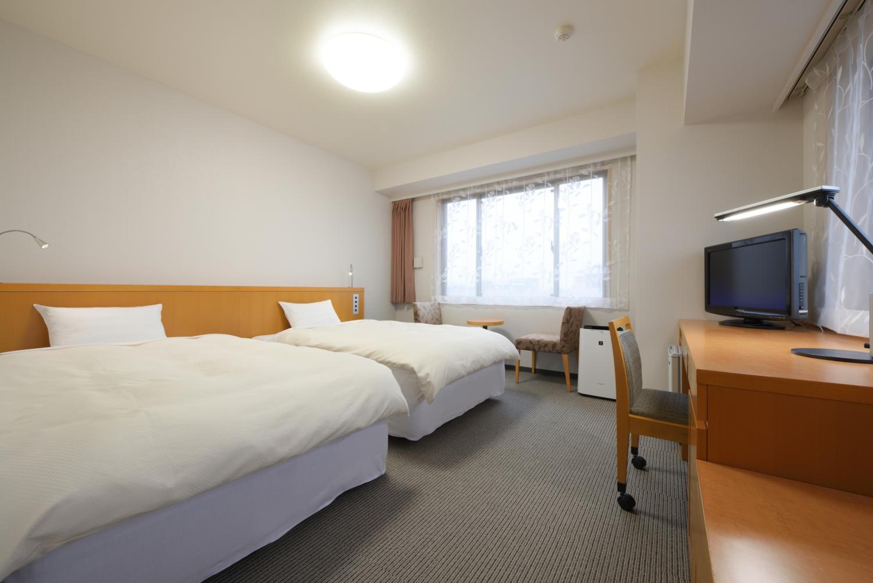 Economy Twin Room - Photo 1