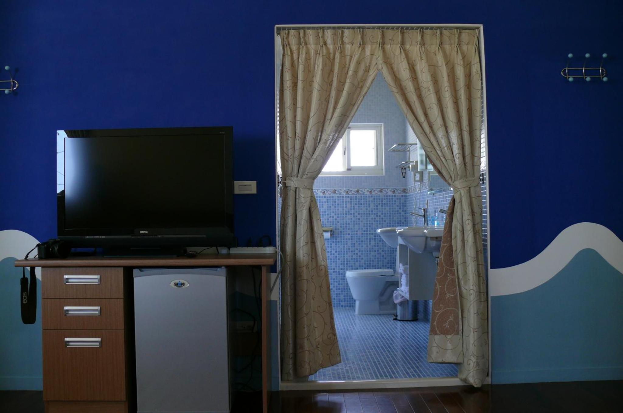 Quadruple Room with Private Bathroom photo 3