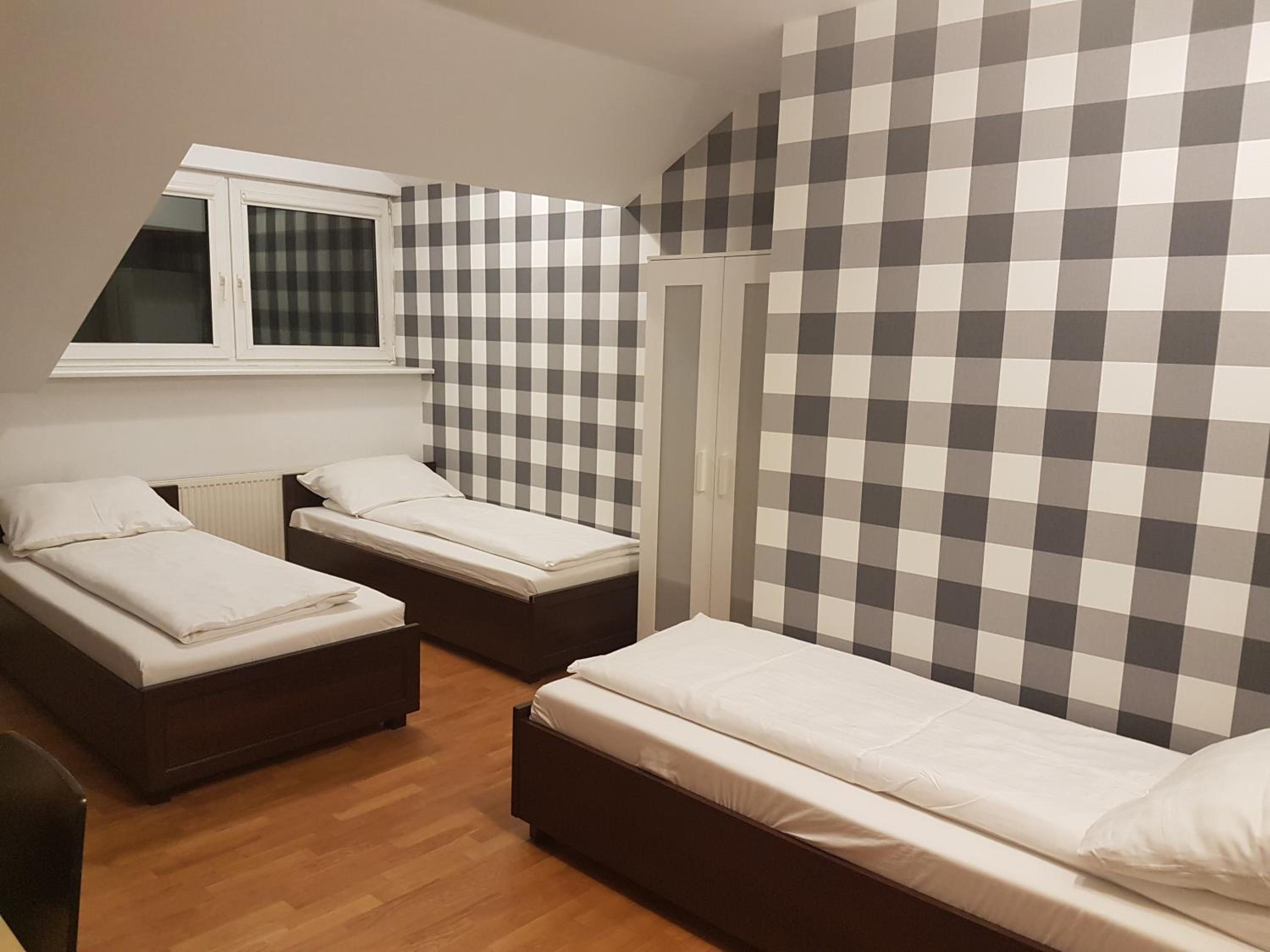 Economy Quadruple Room with Shared Bathroom