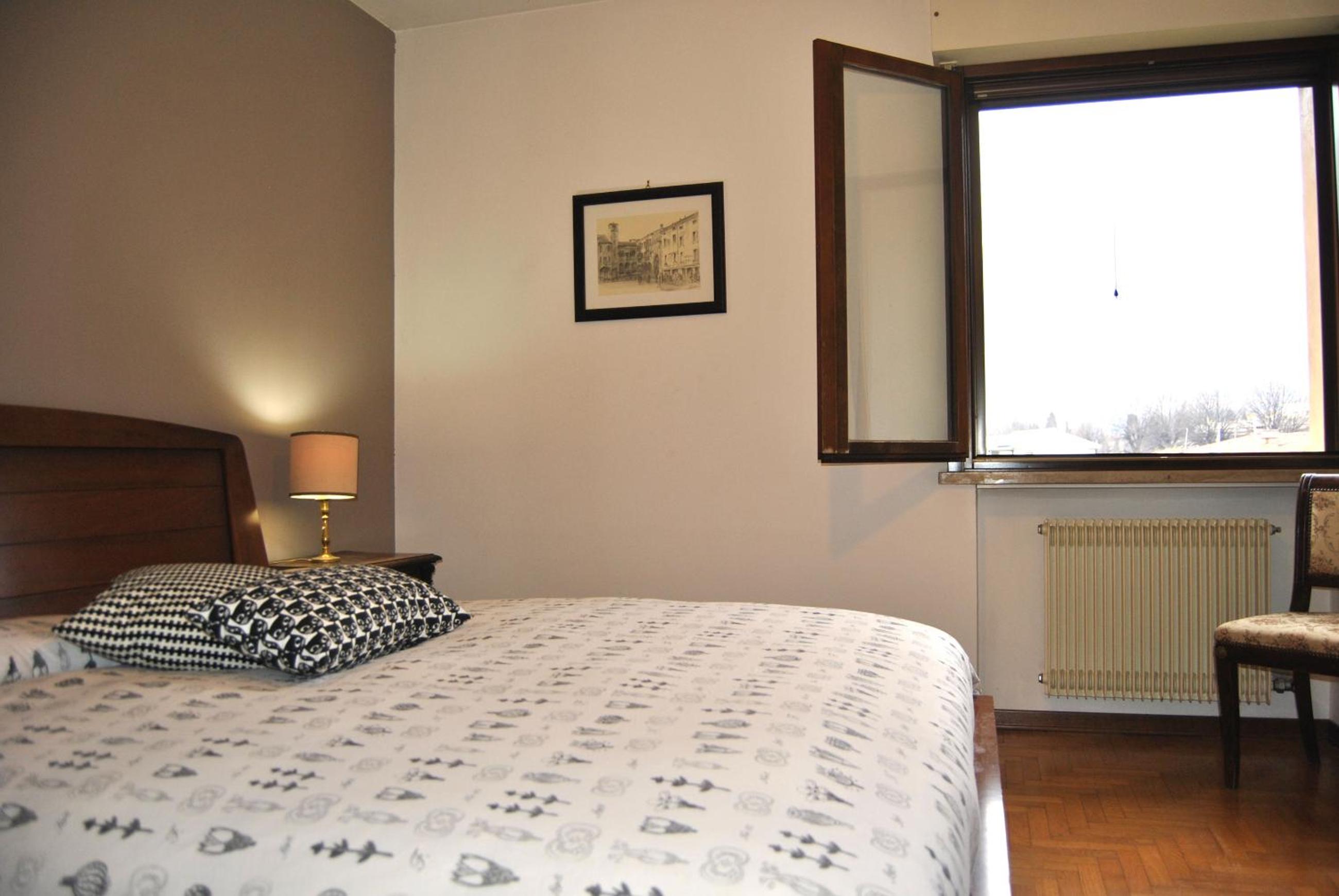 One-Bedroom Apartment - Via Virgilio photo 3