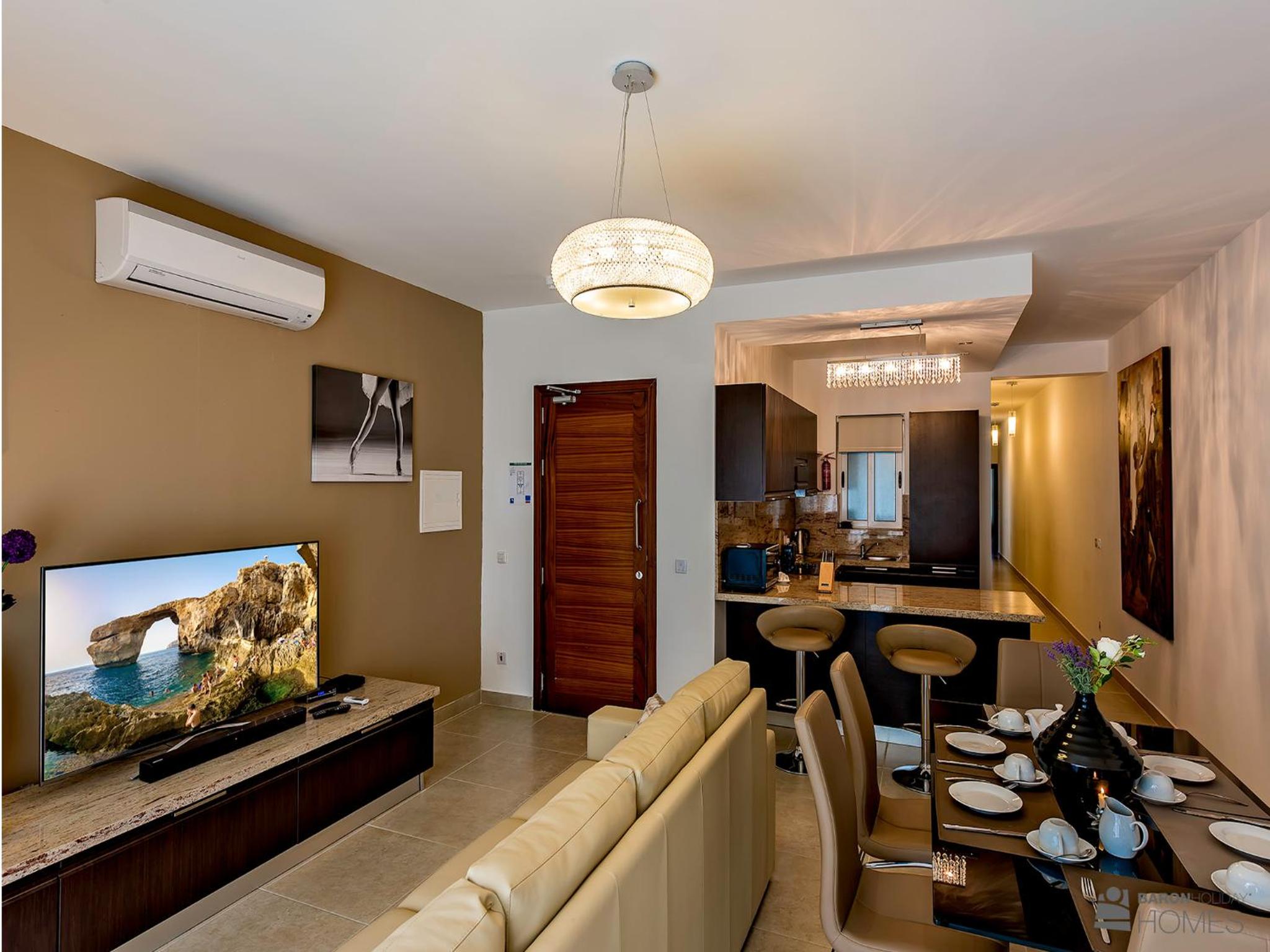 Three-Bedroom Apartment With Balcony And Street Views