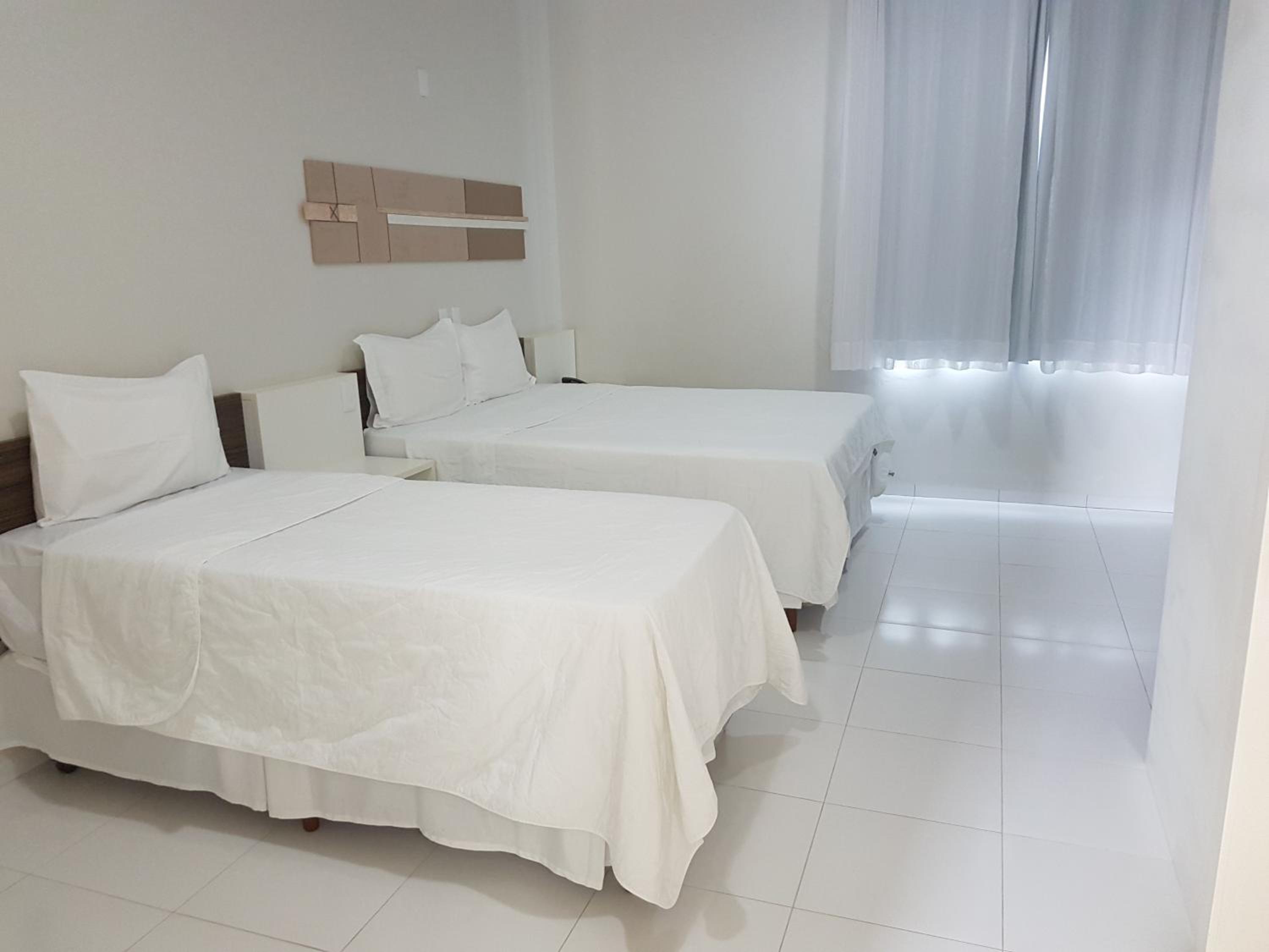 Triple Room (2 Adults + 1 Child) - Photo 1
