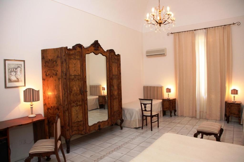 Deluxe Quadruple Room - Photo 7