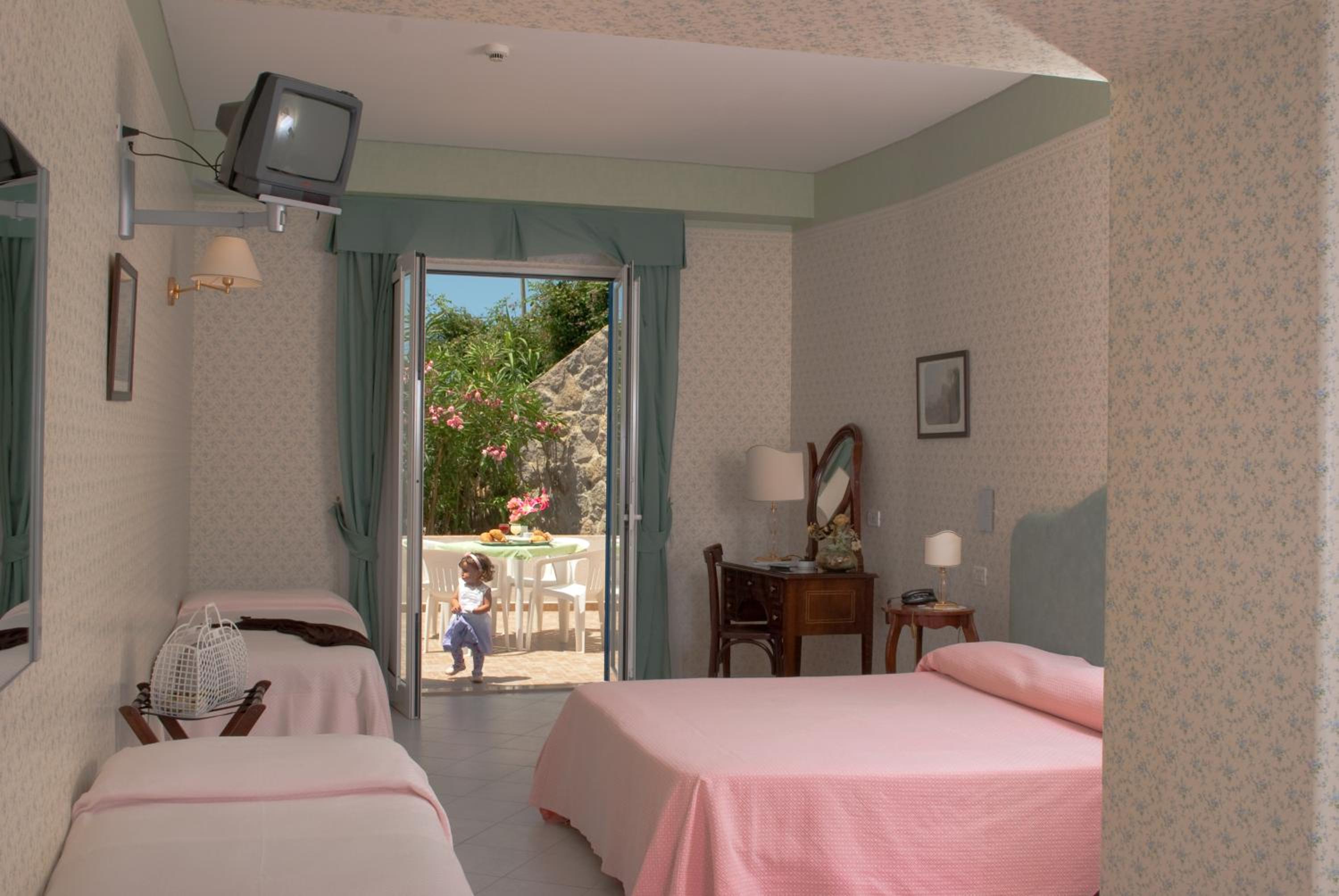 A cozy retreat with garden views awaits you.
