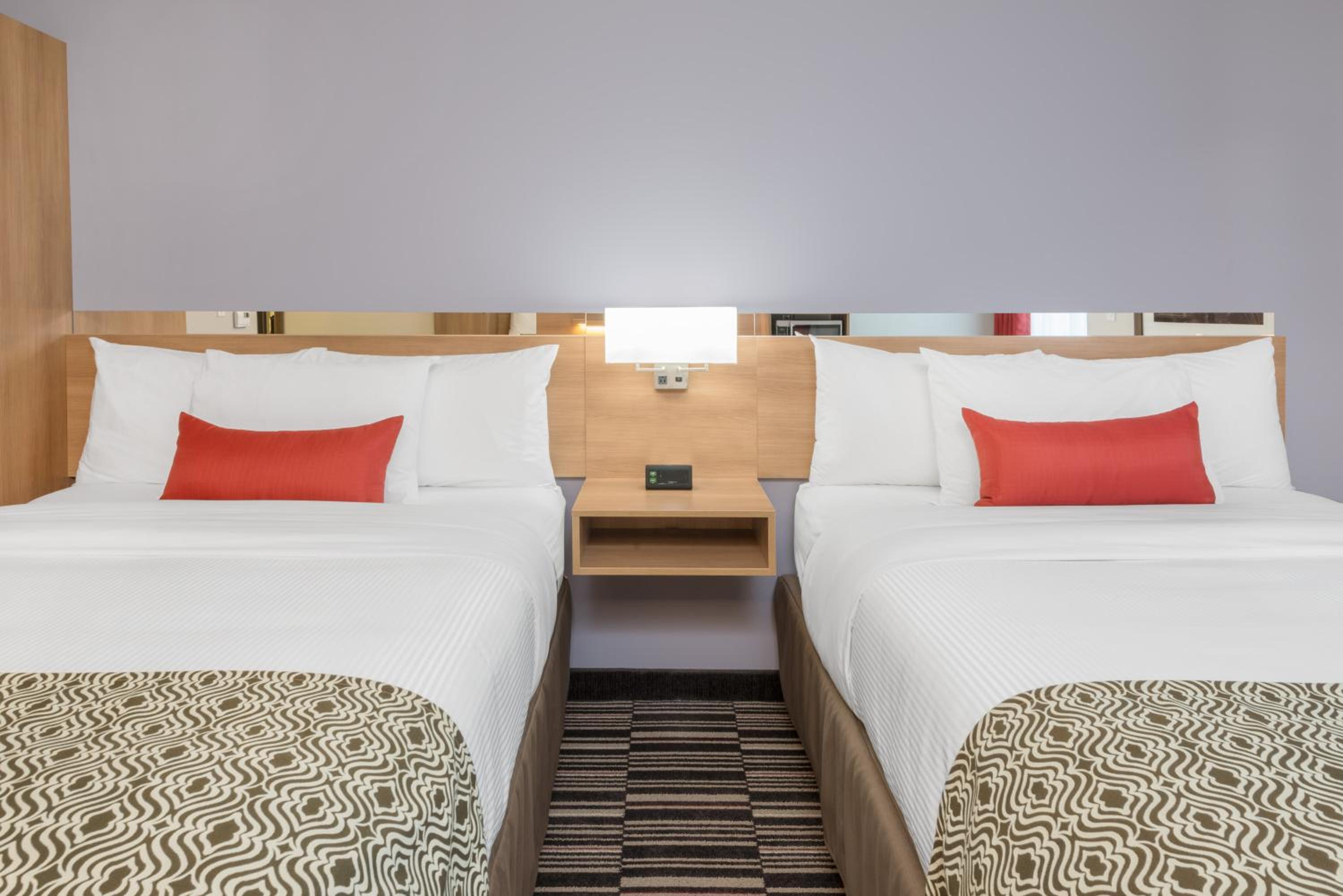 Standard Queen Room with Two Queen Beds - Non-Smoking photo 1