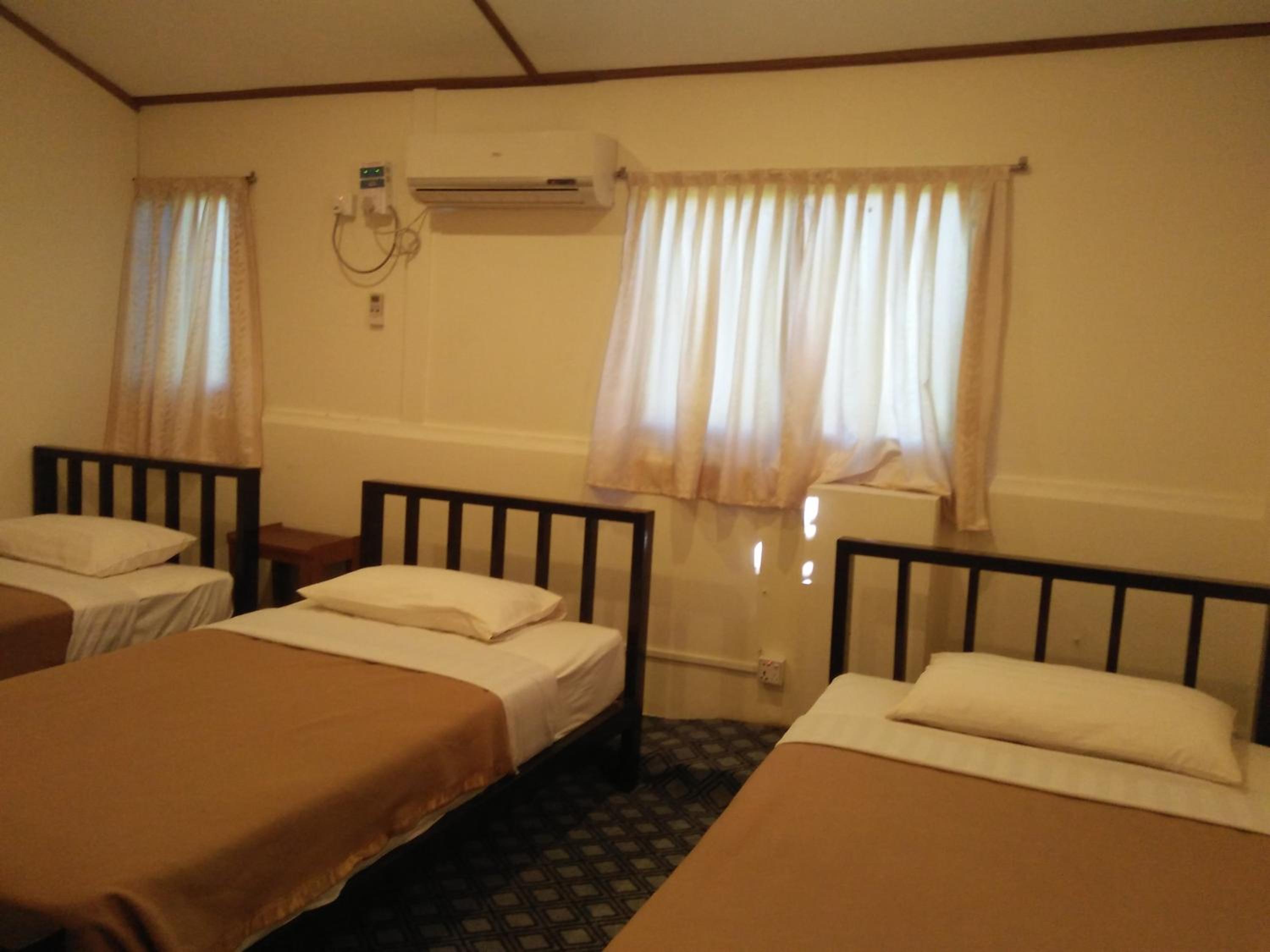 Single Bed in Male Dormitory Room