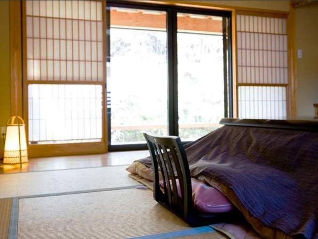 Japanese-Style Room with Shared Bathroom photo 2