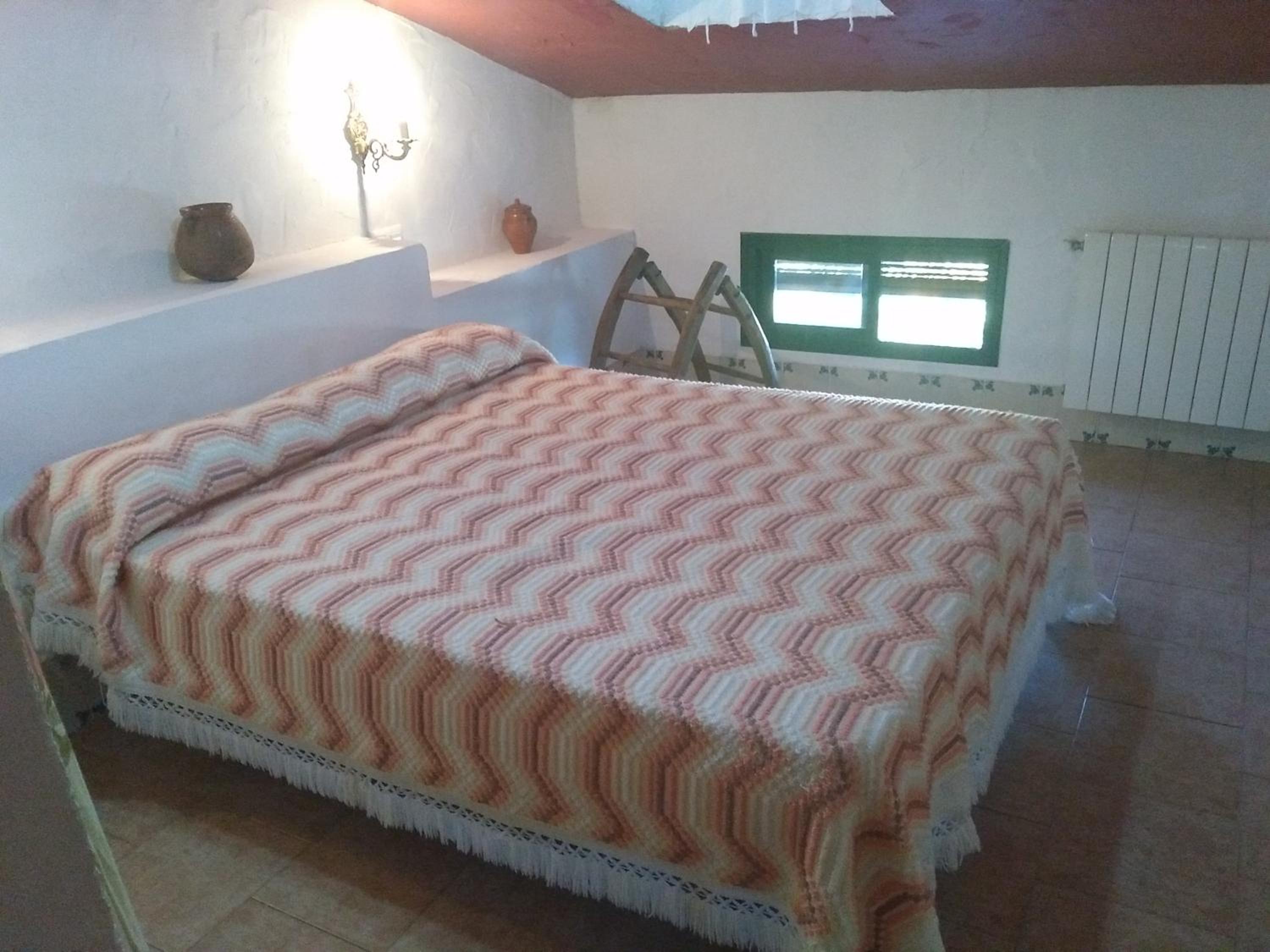 Casa de cuatro habitaciones