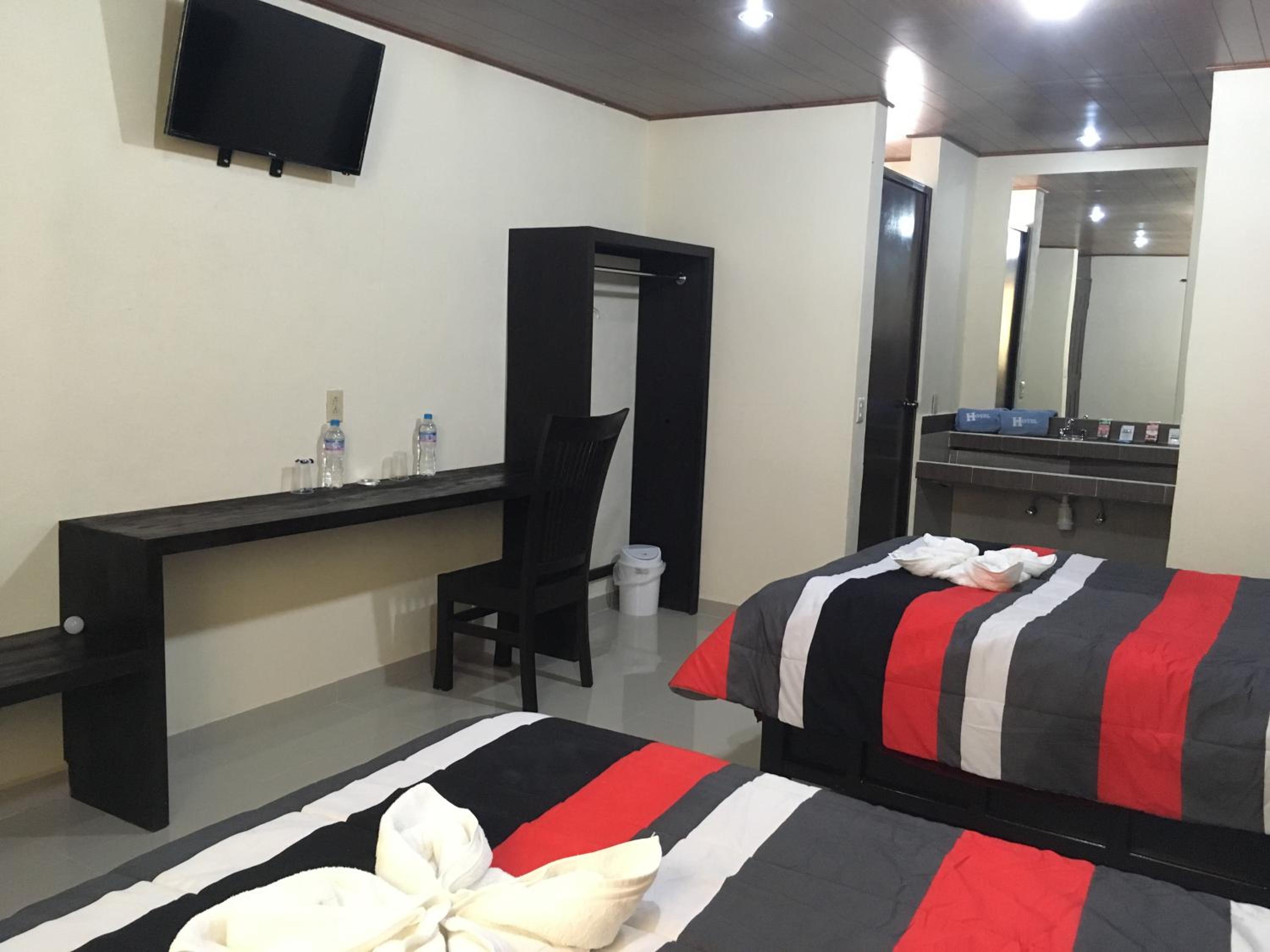 Deluxe Queen Room with Two Queen Beds photo 1