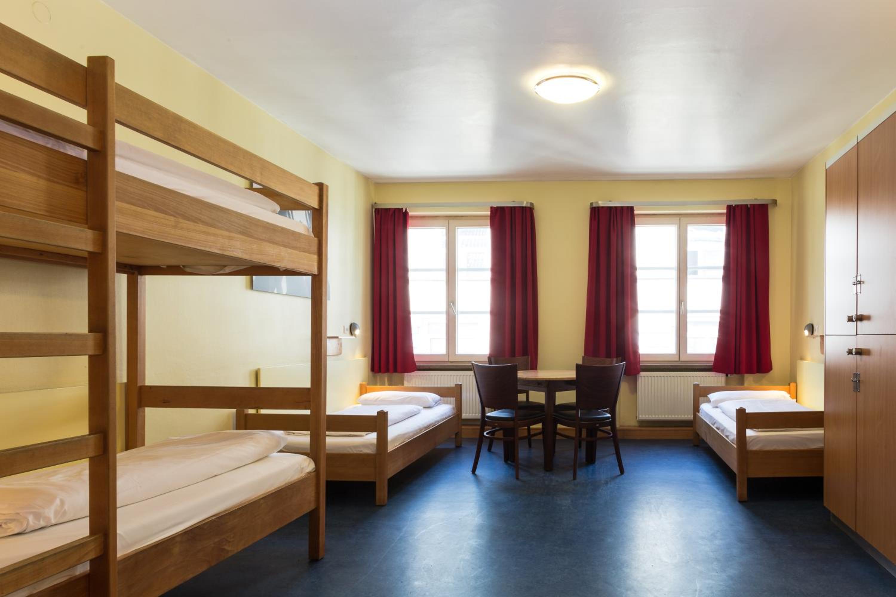 Bed in a Quadruple Mixed Dormitory Room with Private Bathroom'