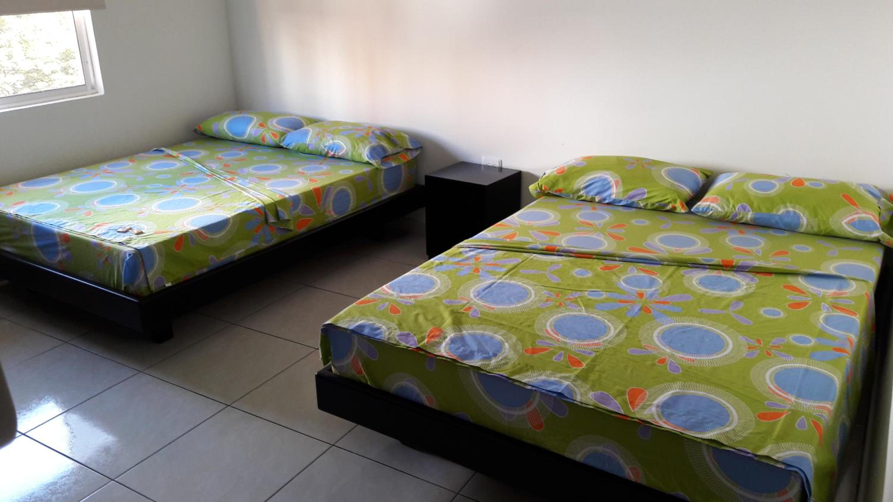Deluxe Queen Room with Two Queen Beds photo 2