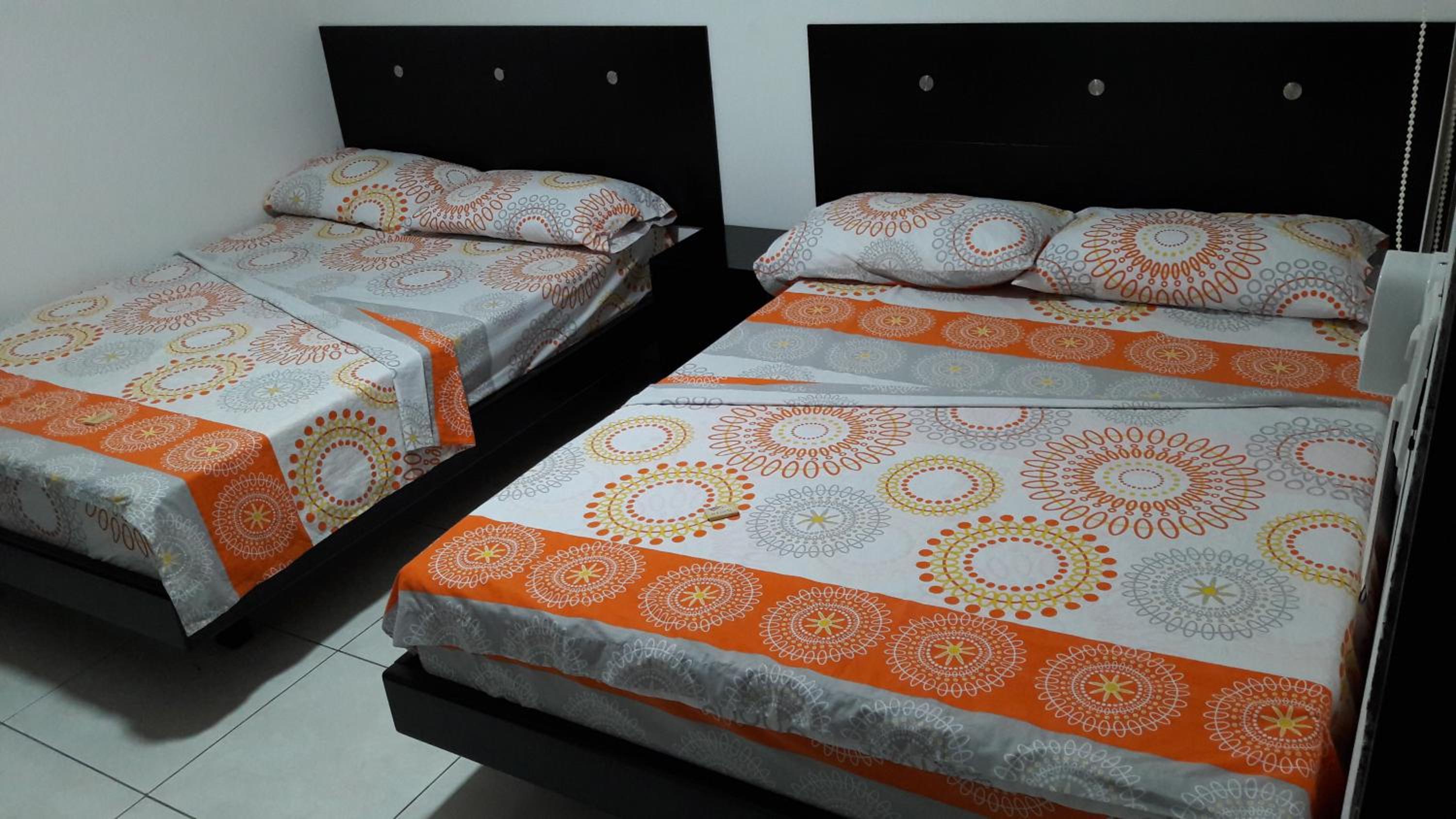 Deluxe Queen Room with Two Queen Beds photo 3