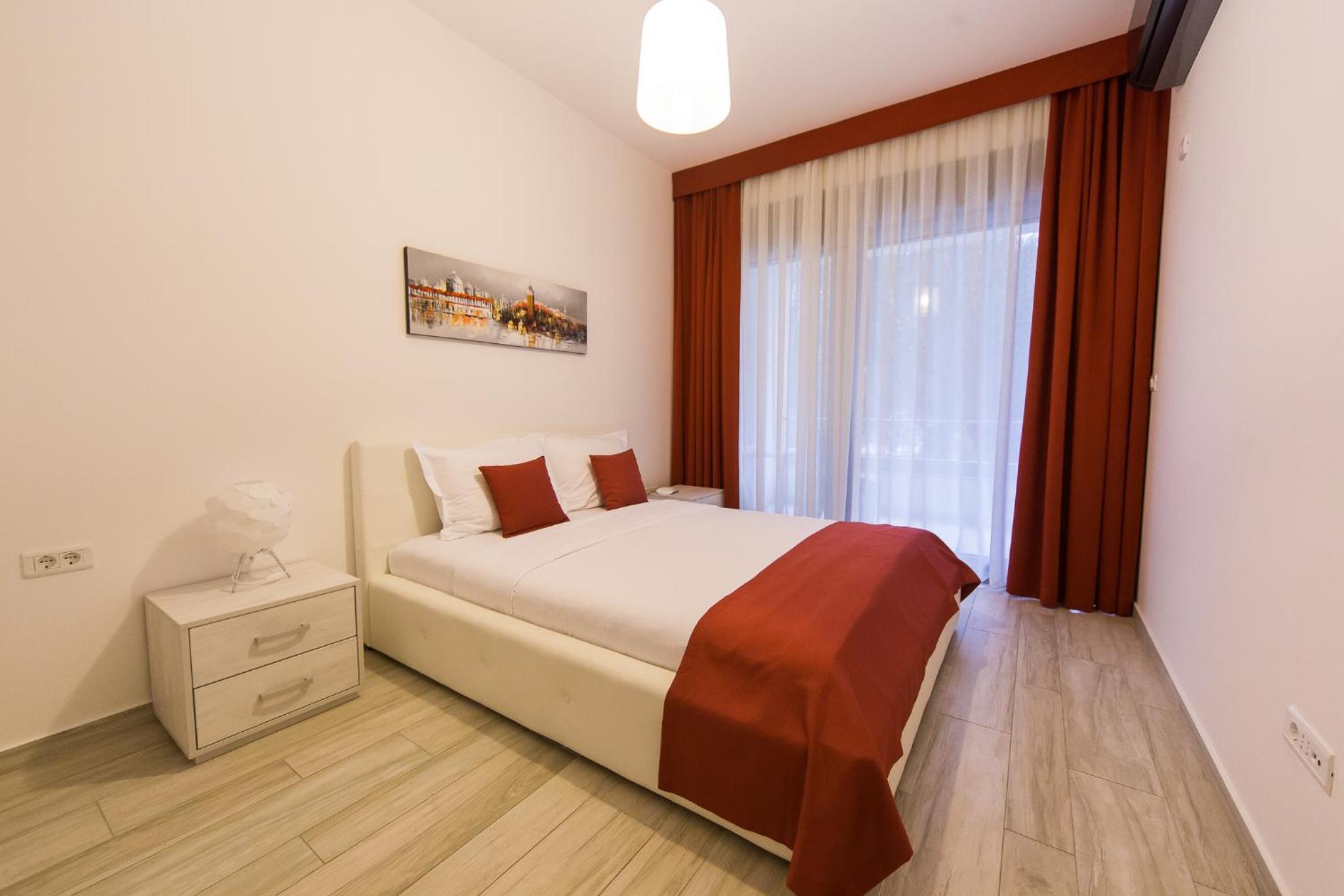One-Bedroom Apartment with Terrace and Side Sea View