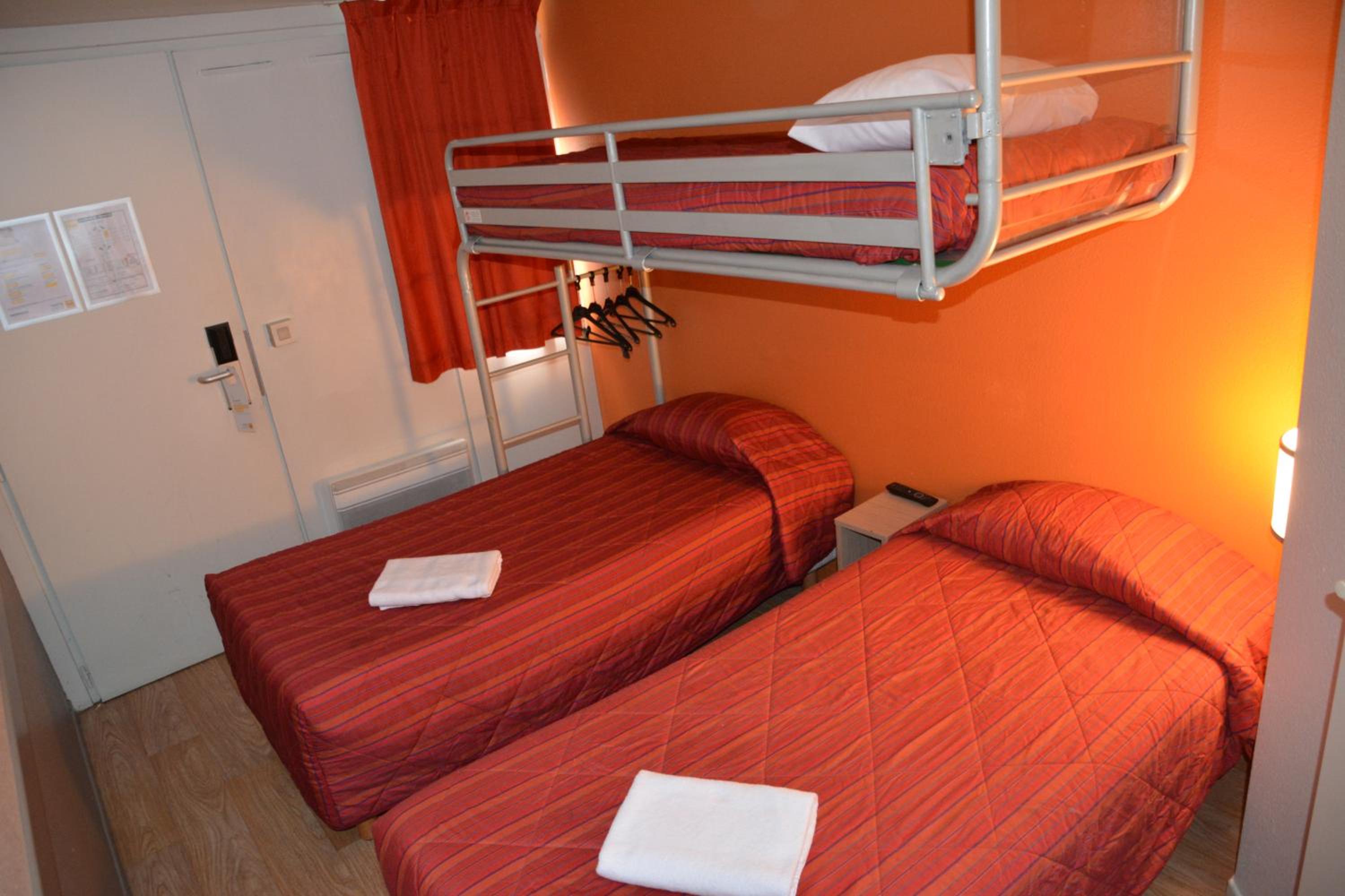 Standard Room with Two Single Beds and One Bunk Bed - Photo 1