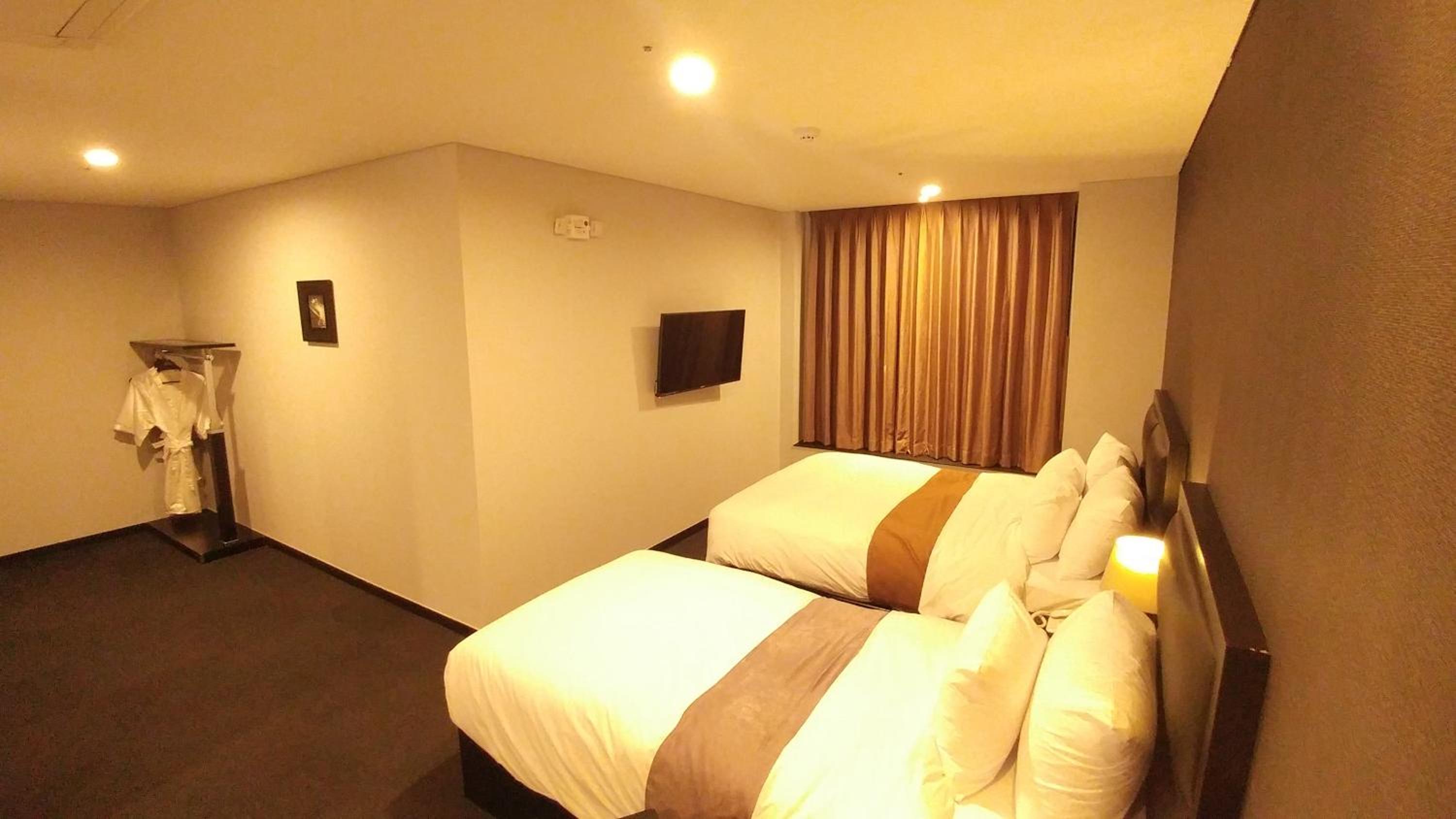 Deluxe Triple Room