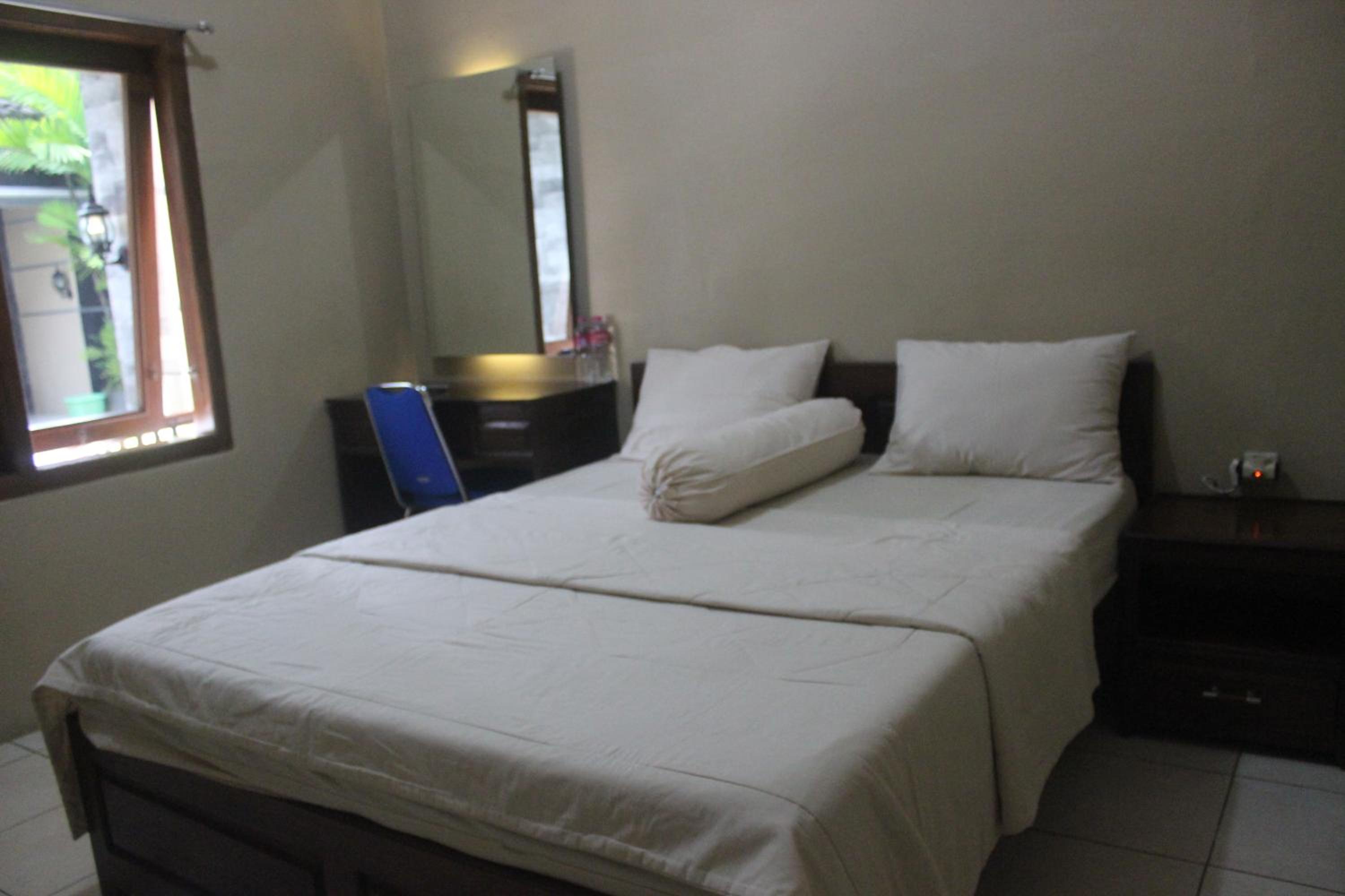 Deluxe Double Room (2 Adults + 1 Child) photo 2