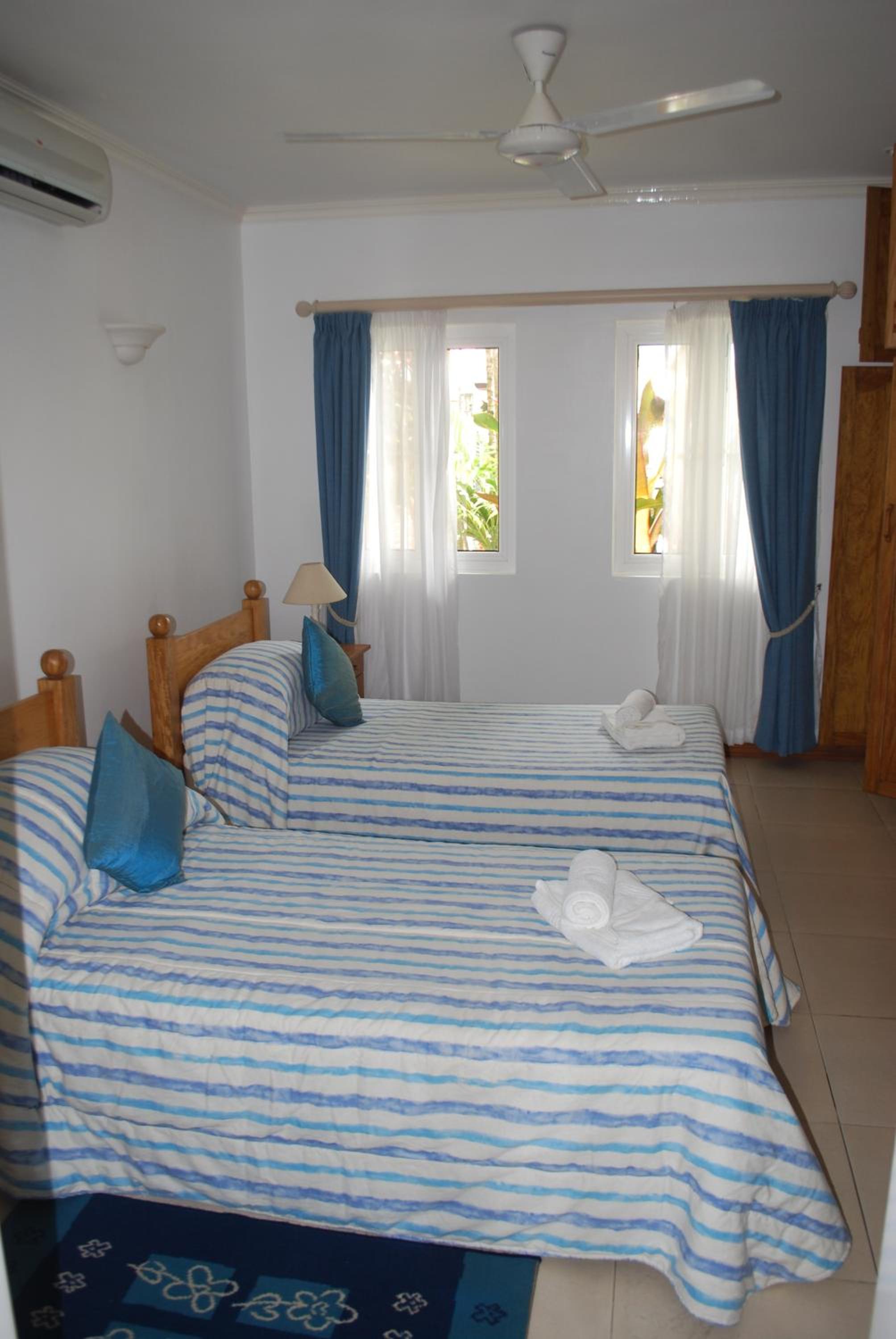 Ein-Zimmer-Apartment mit zwei Einzelbetten